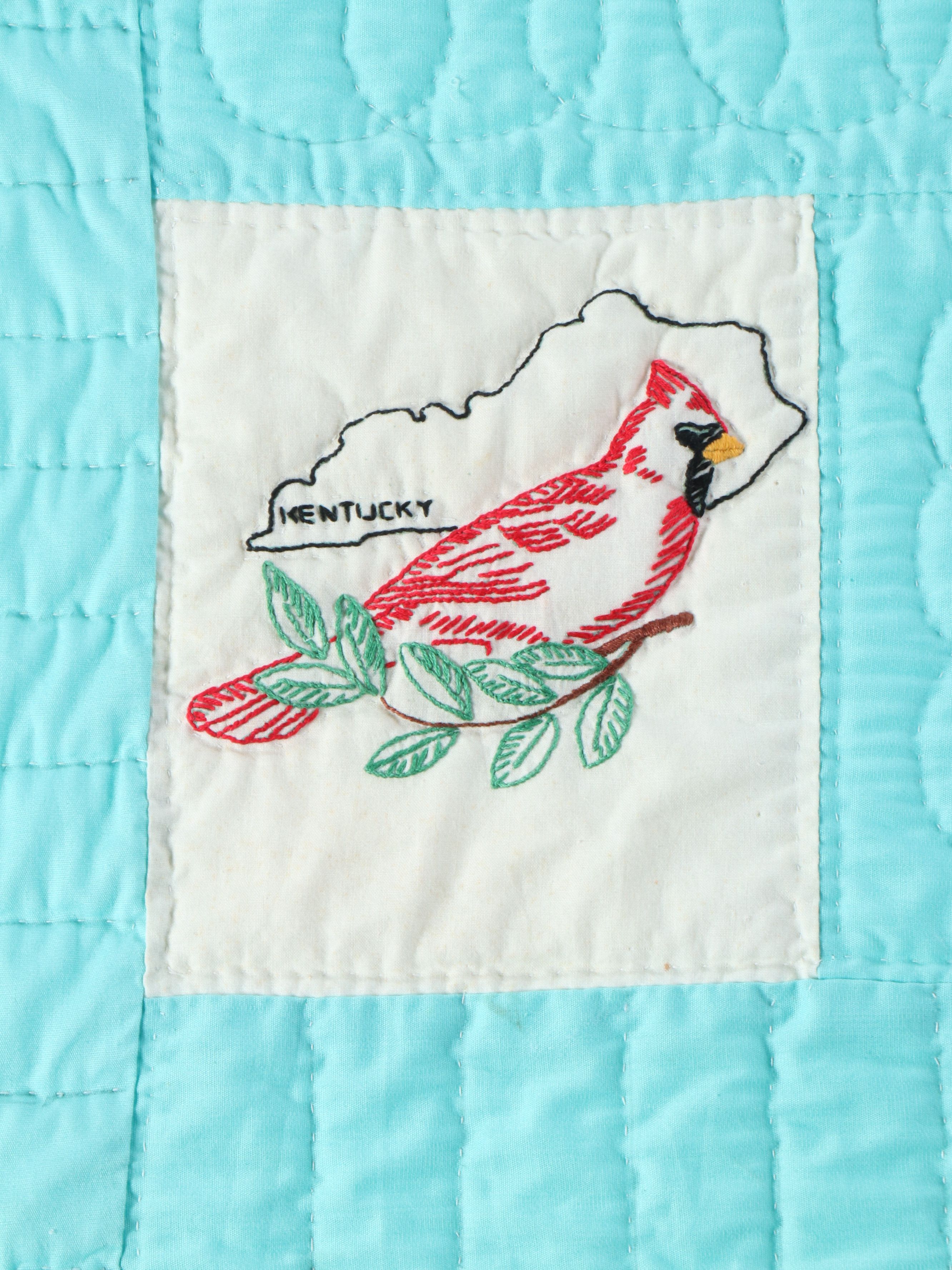Embroidered State Bird Quilt with Wood Quilt Stand