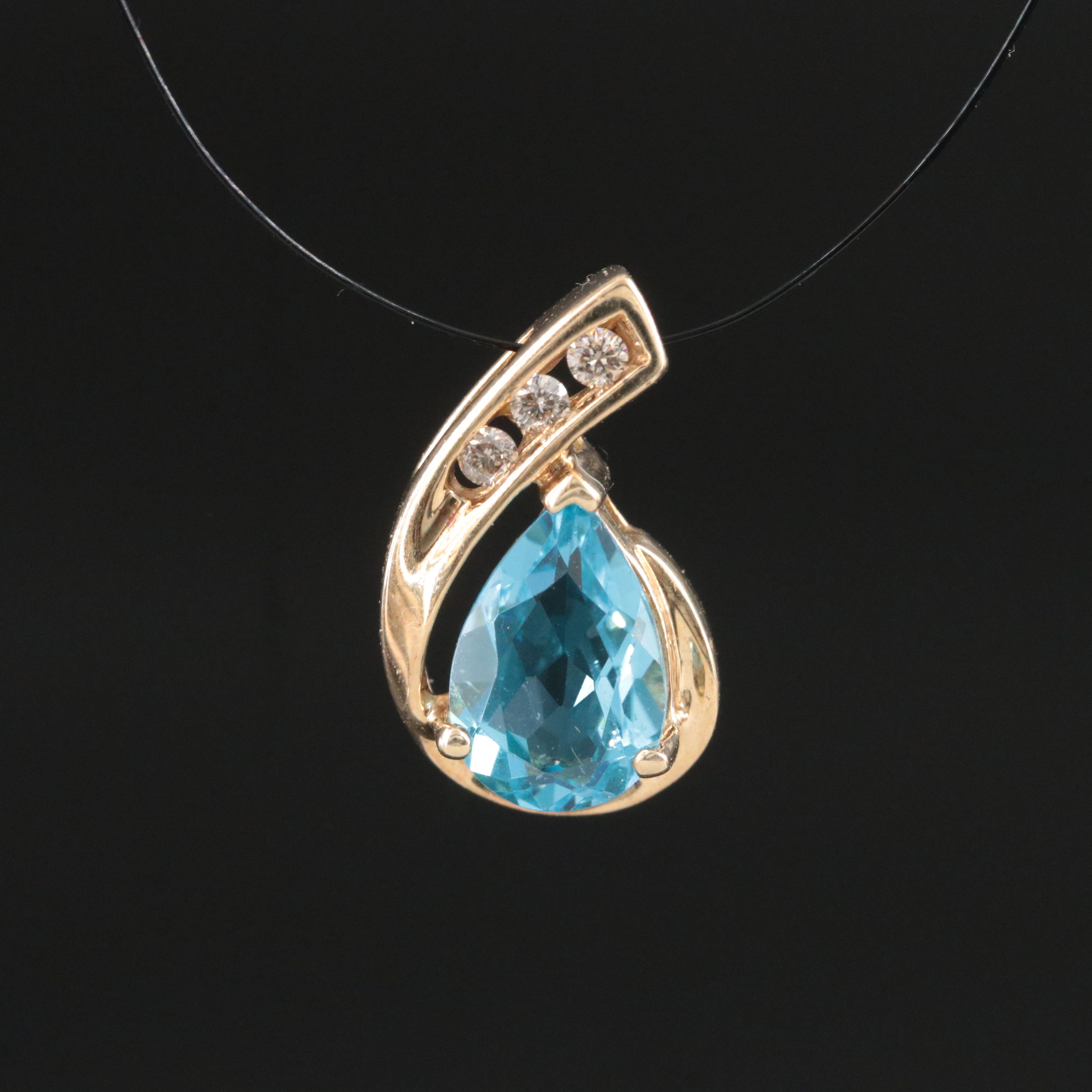 10K Swiss Blue Topaz and Diamond Pendant