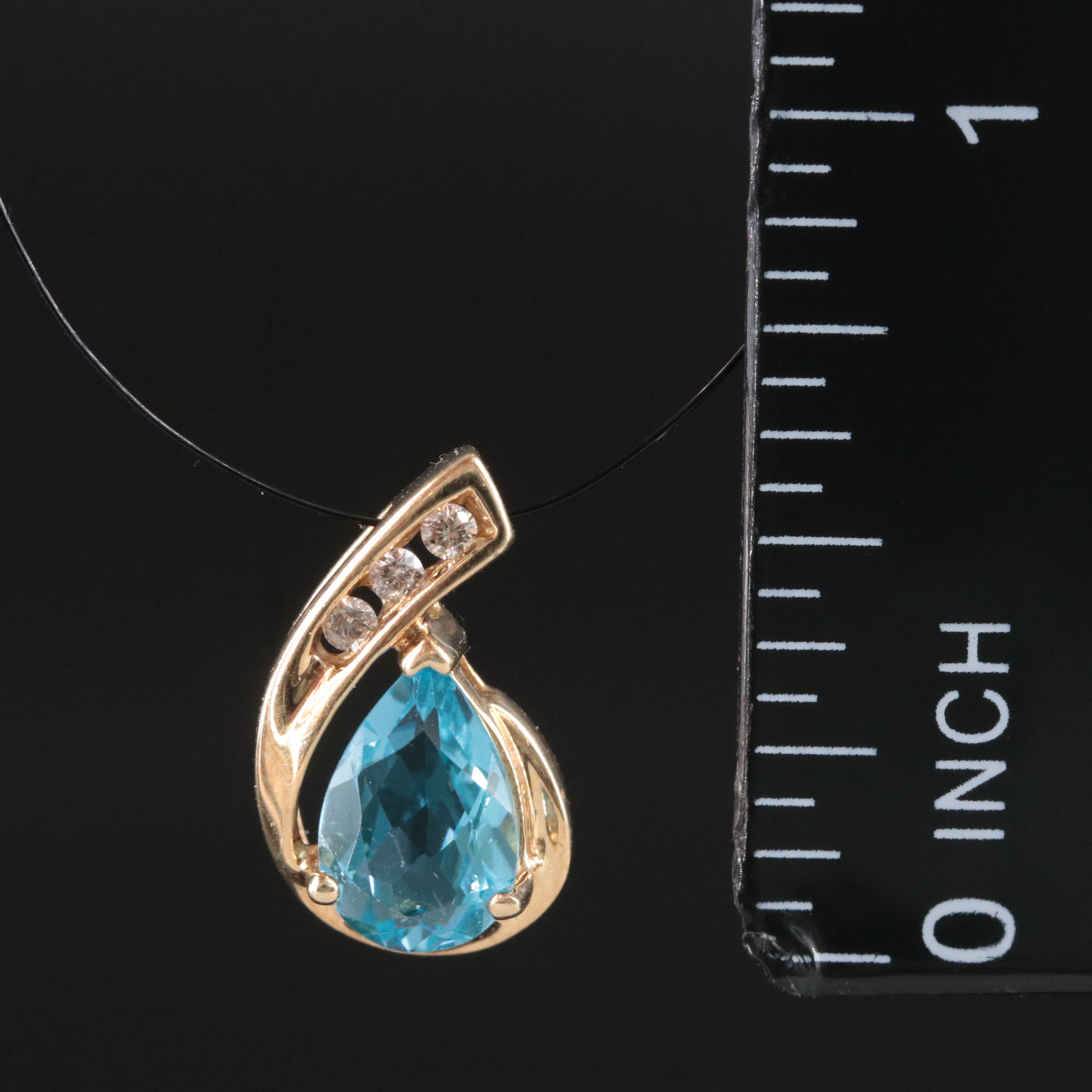 10K Swiss Blue Topaz and Diamond Pendant