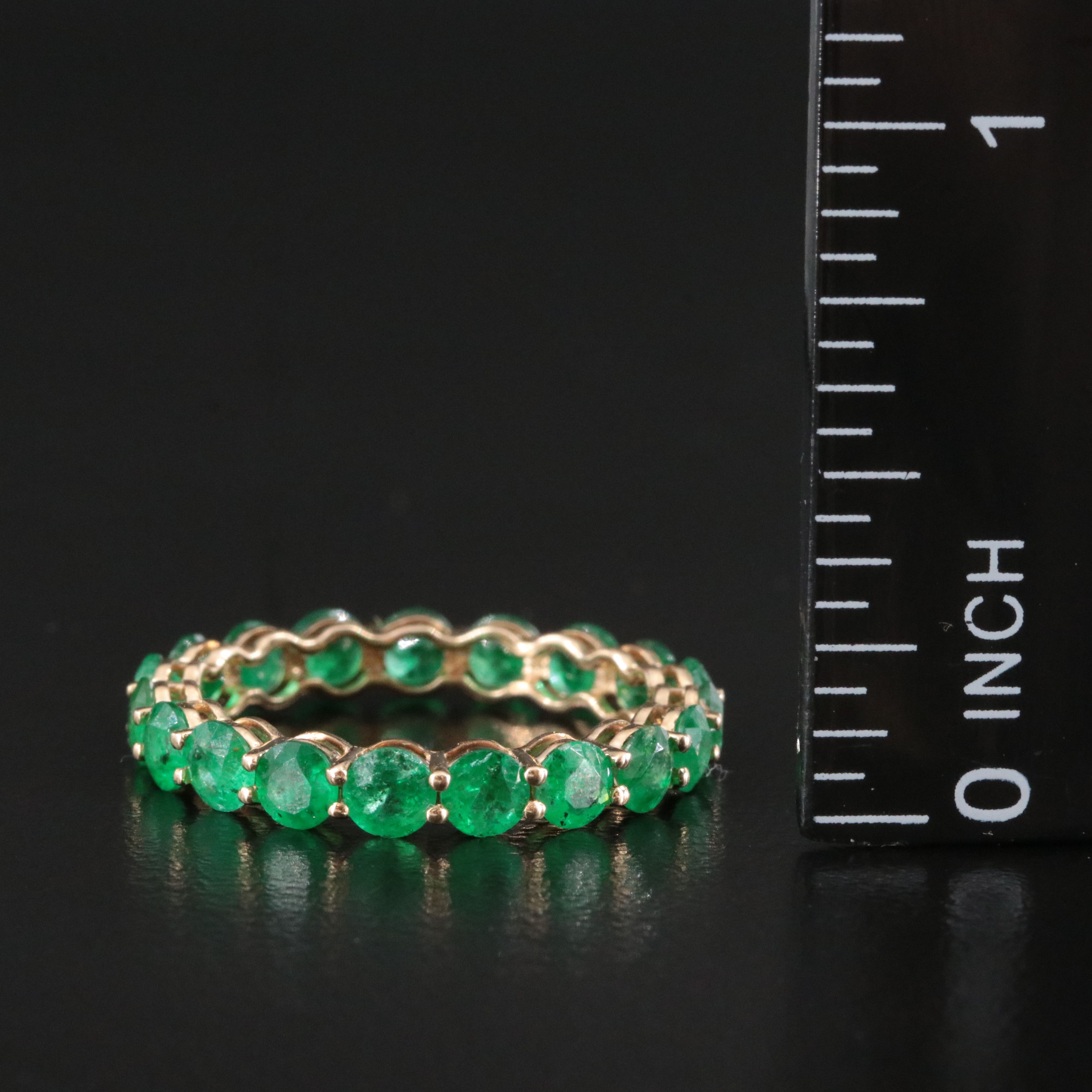 14K 2.42 CTW Emerald Eternity Band