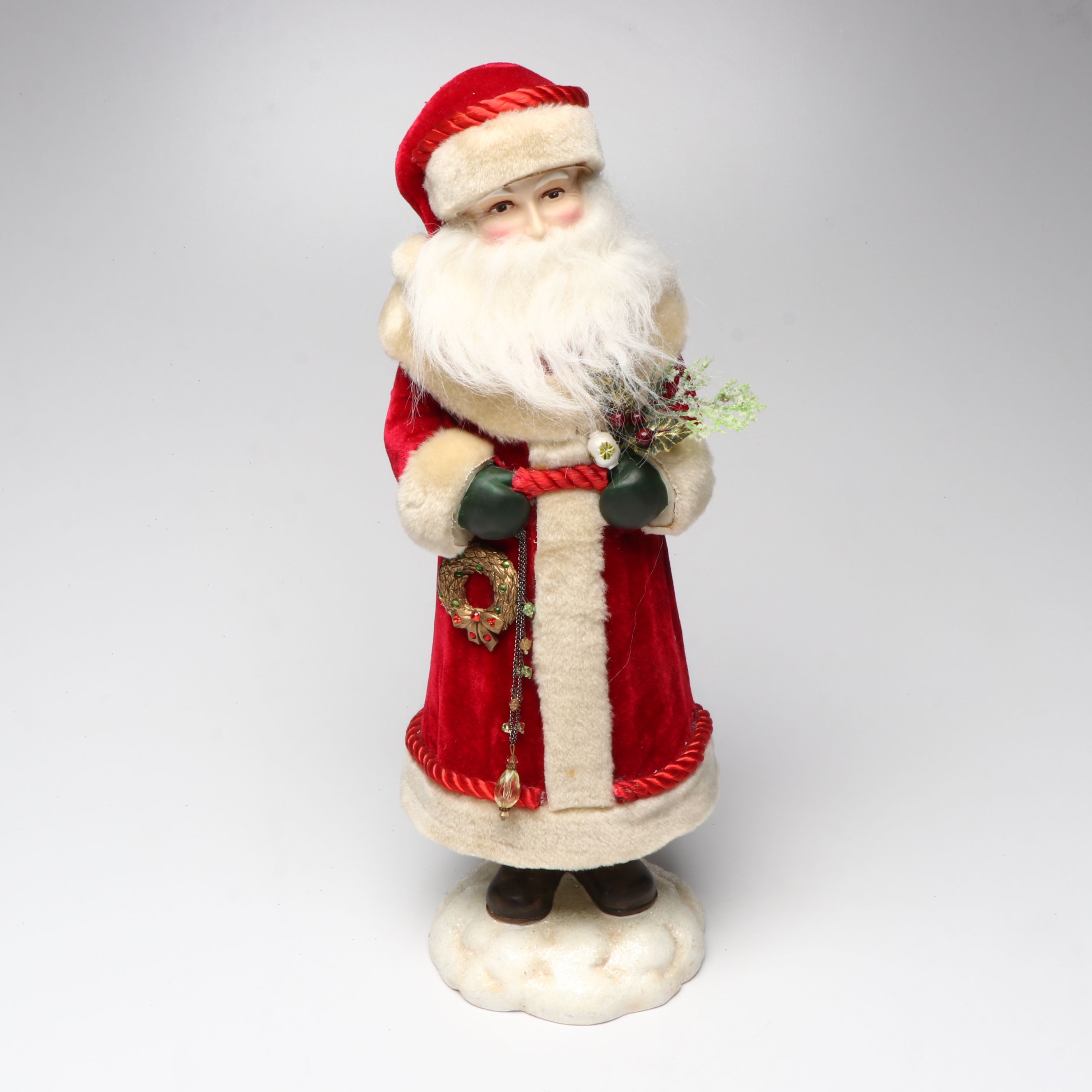 Karen Didion and Other Santa Figurines with Illuminated Gift Box Holiday Décor
