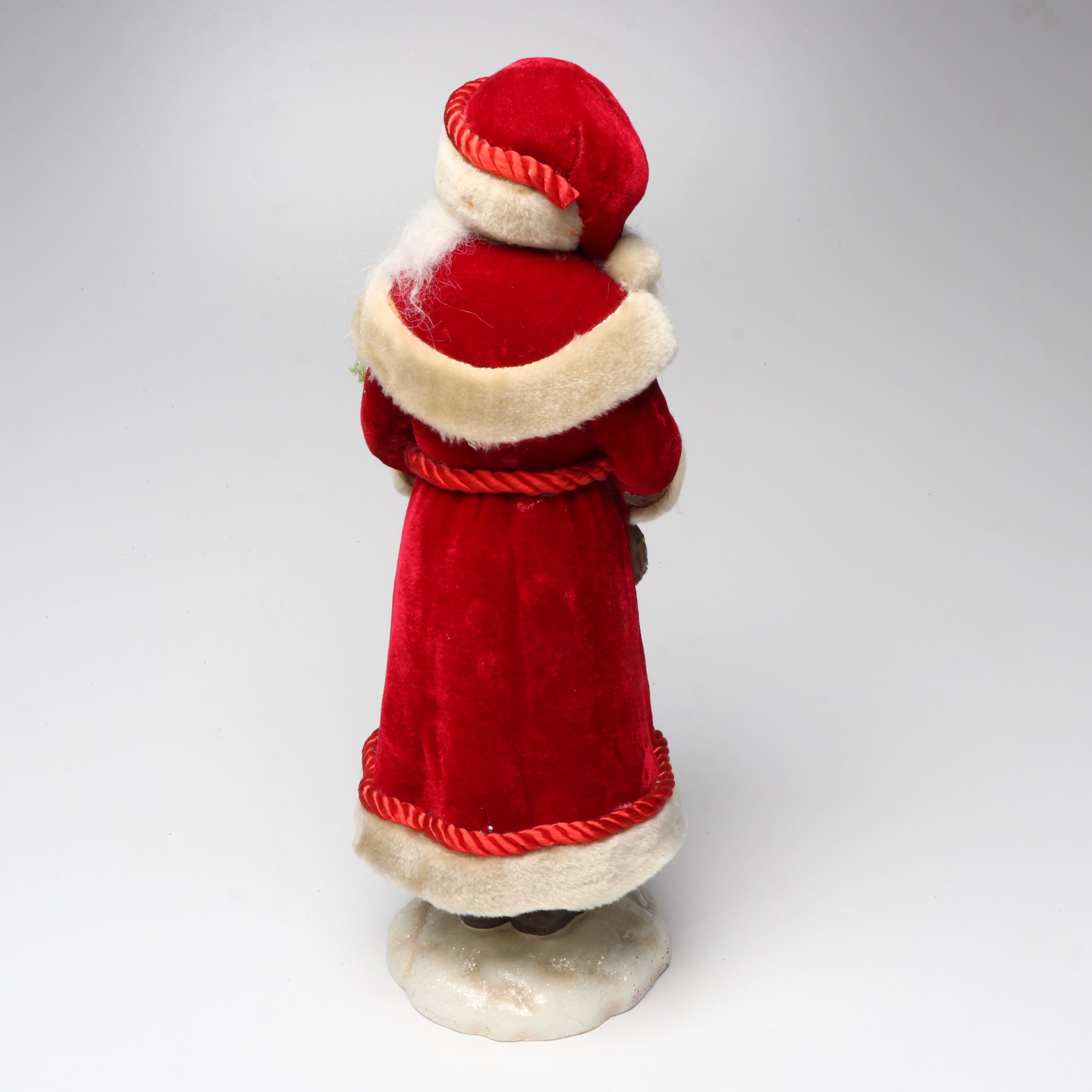 Karen Didion and Other Santa Figurines with Illuminated Gift Box Holiday Décor