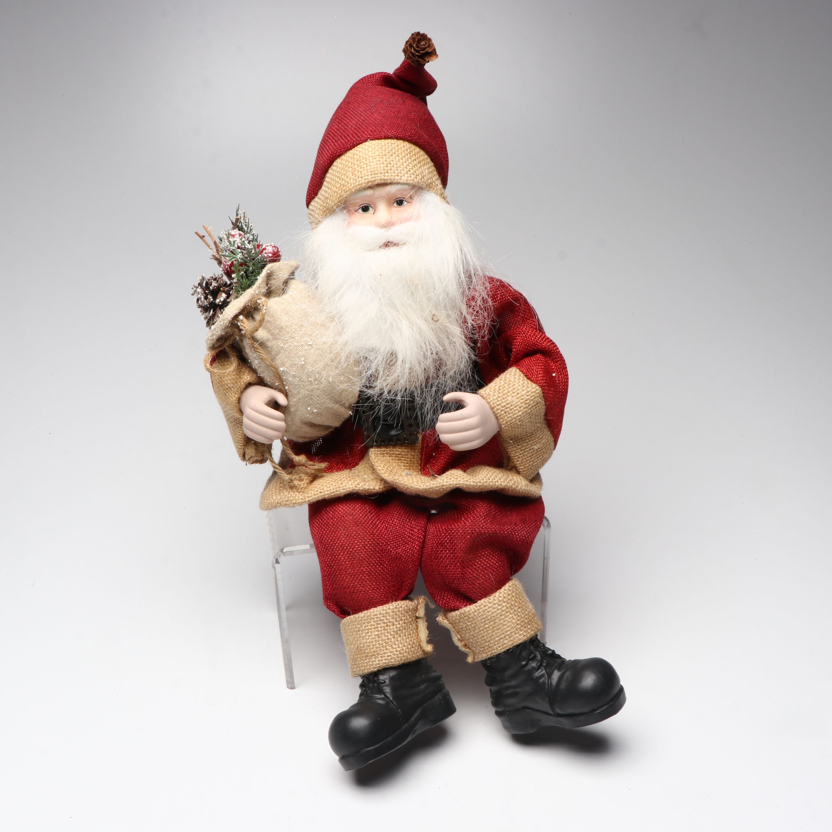 Karen Didion and Other Santa Figurines with Illuminated Gift Box Holiday Décor