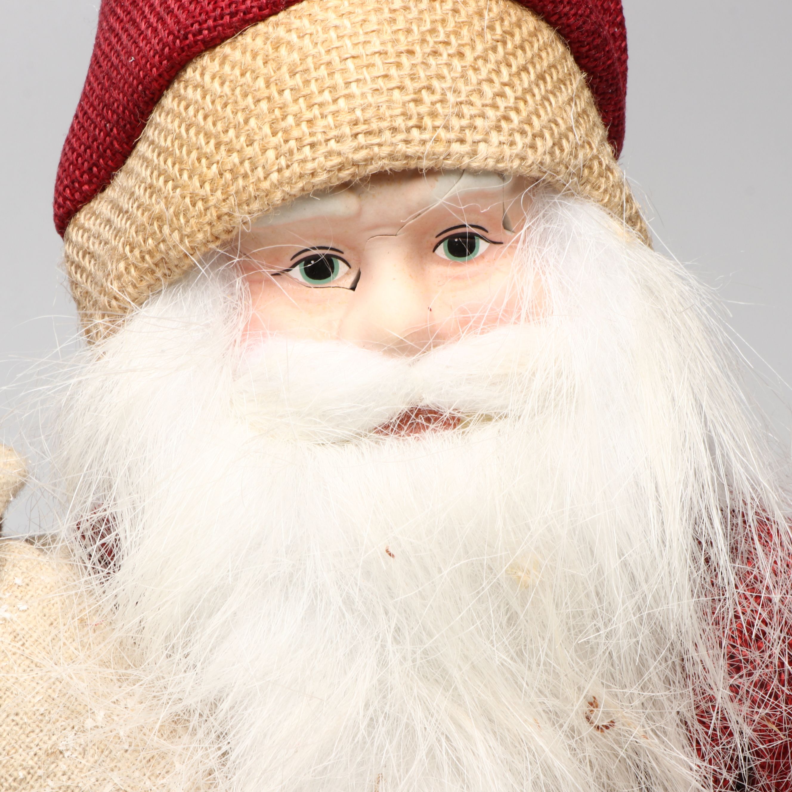 Karen Didion and Other Santa Figurines with Illuminated Gift Box Holiday Décor