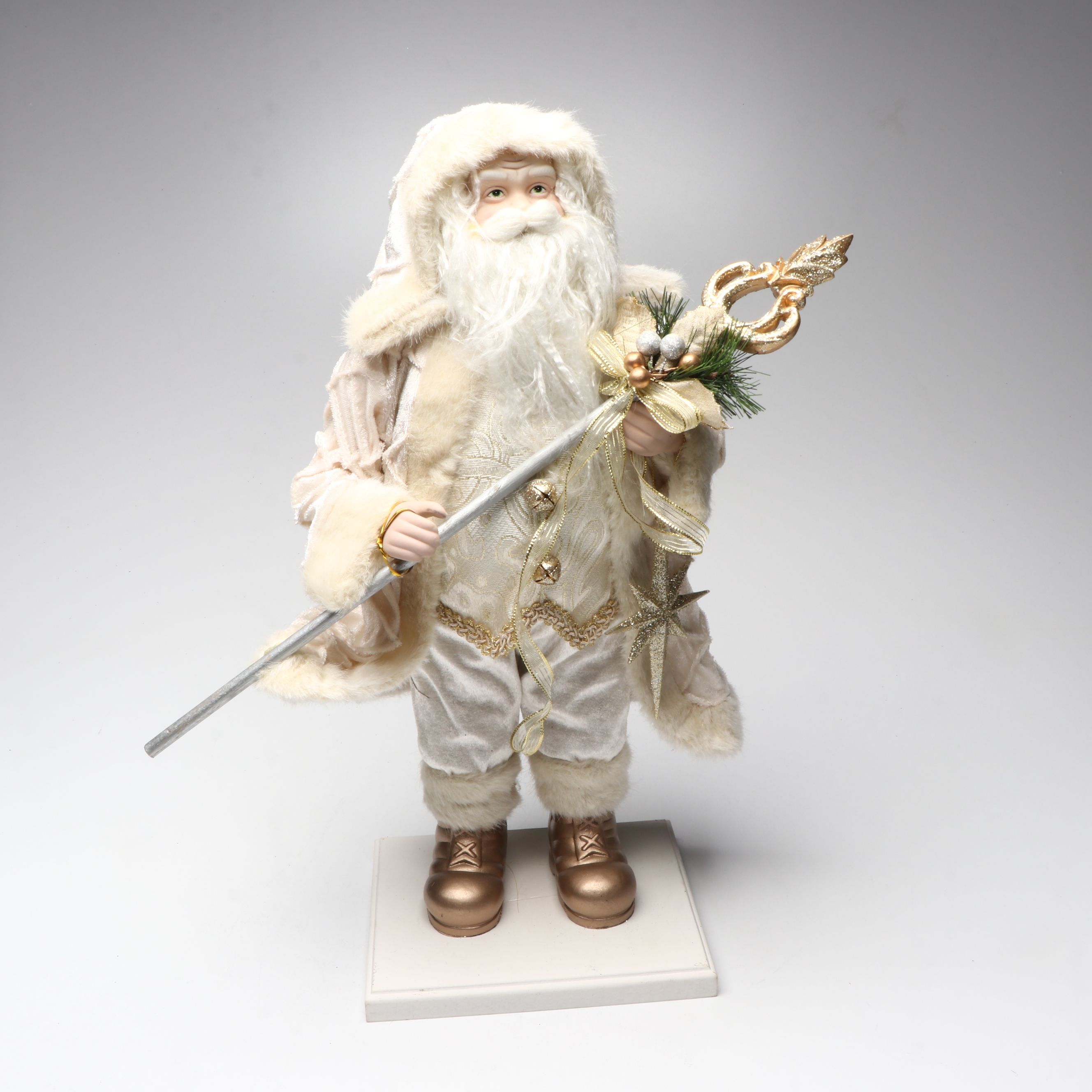 Karen Didion and Other Santa Figurines with Illuminated Gift Box Holiday Décor