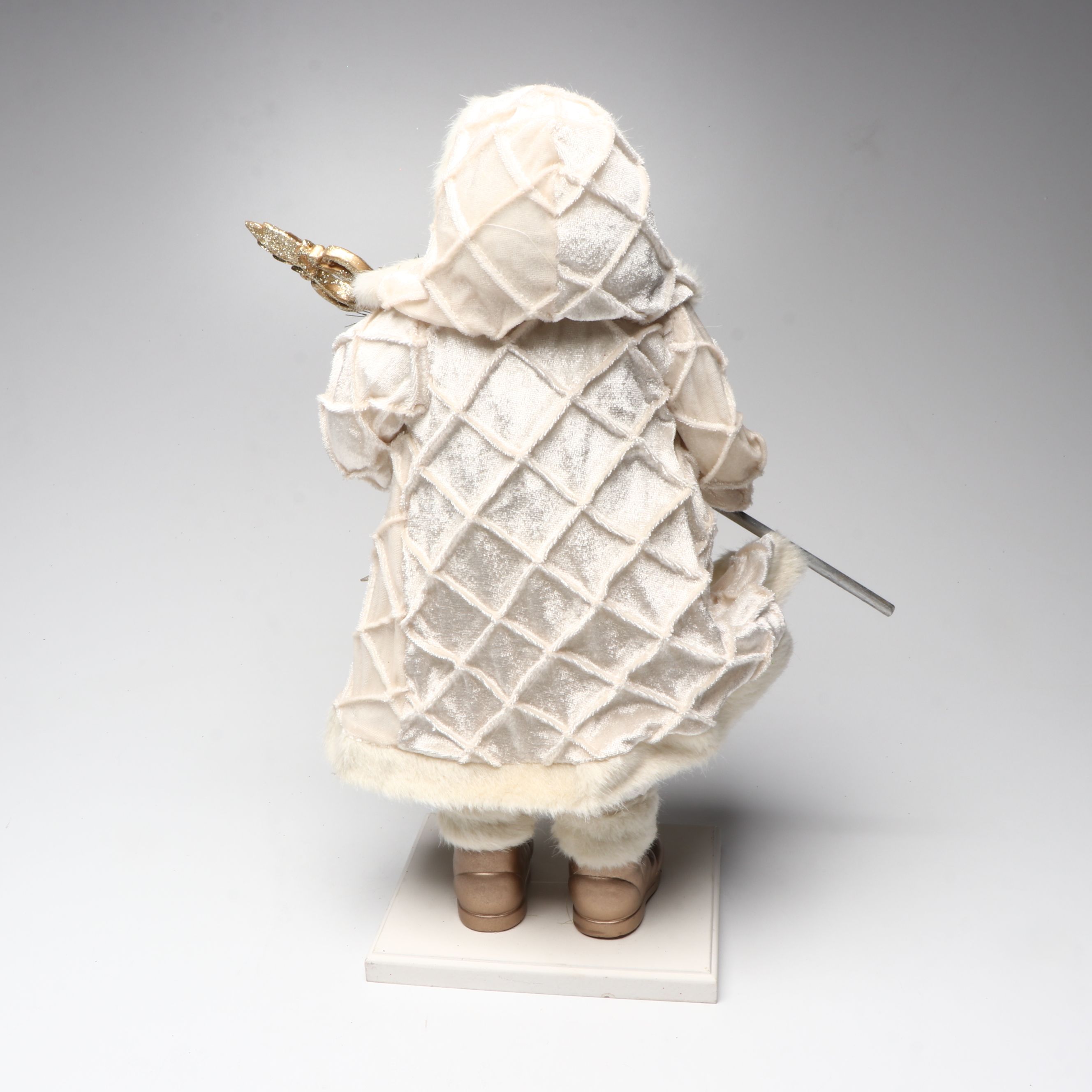 Karen Didion and Other Santa Figurines with Illuminated Gift Box Holiday Décor