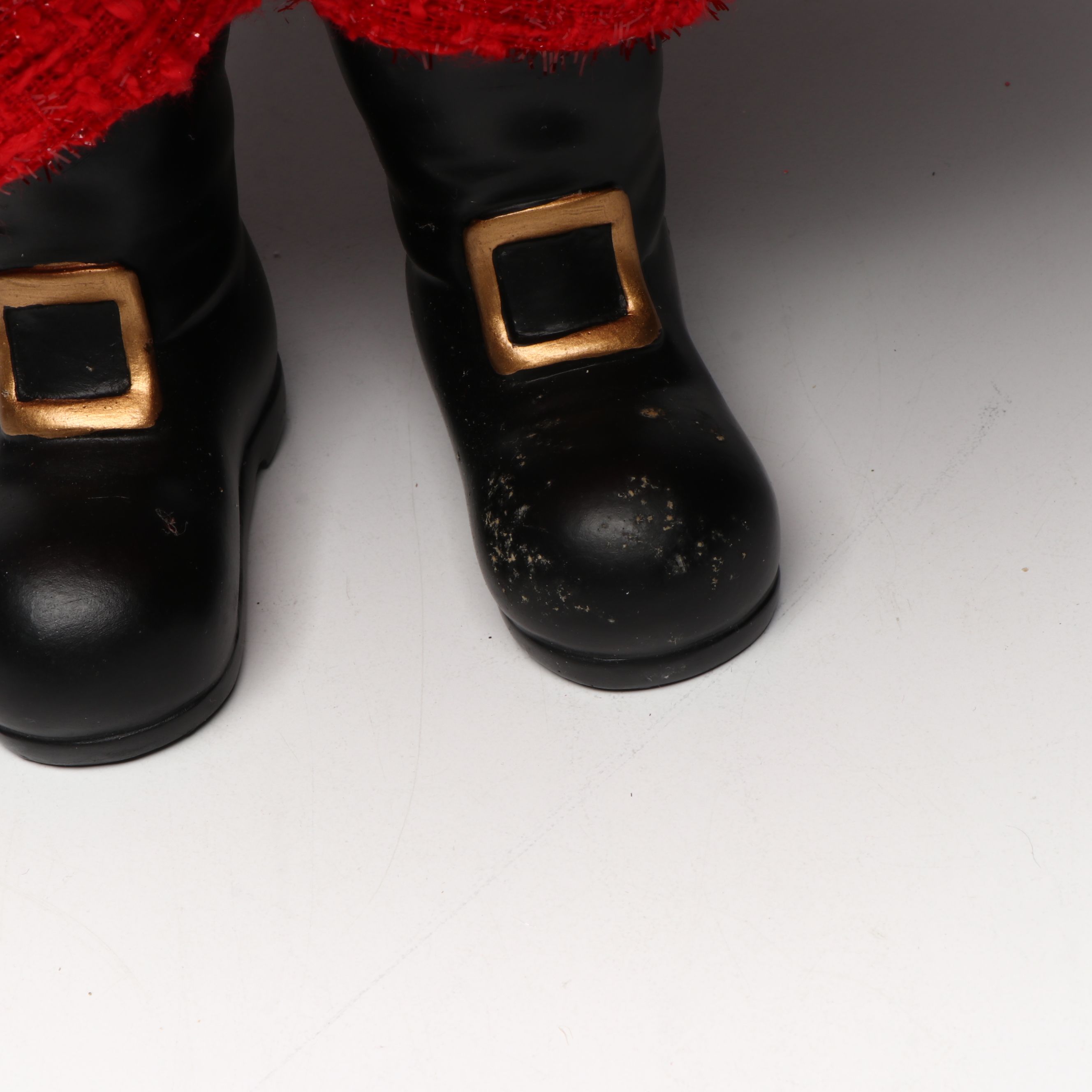 Karen Didion and Other Santa Figurines with Illuminated Gift Box Holiday Décor