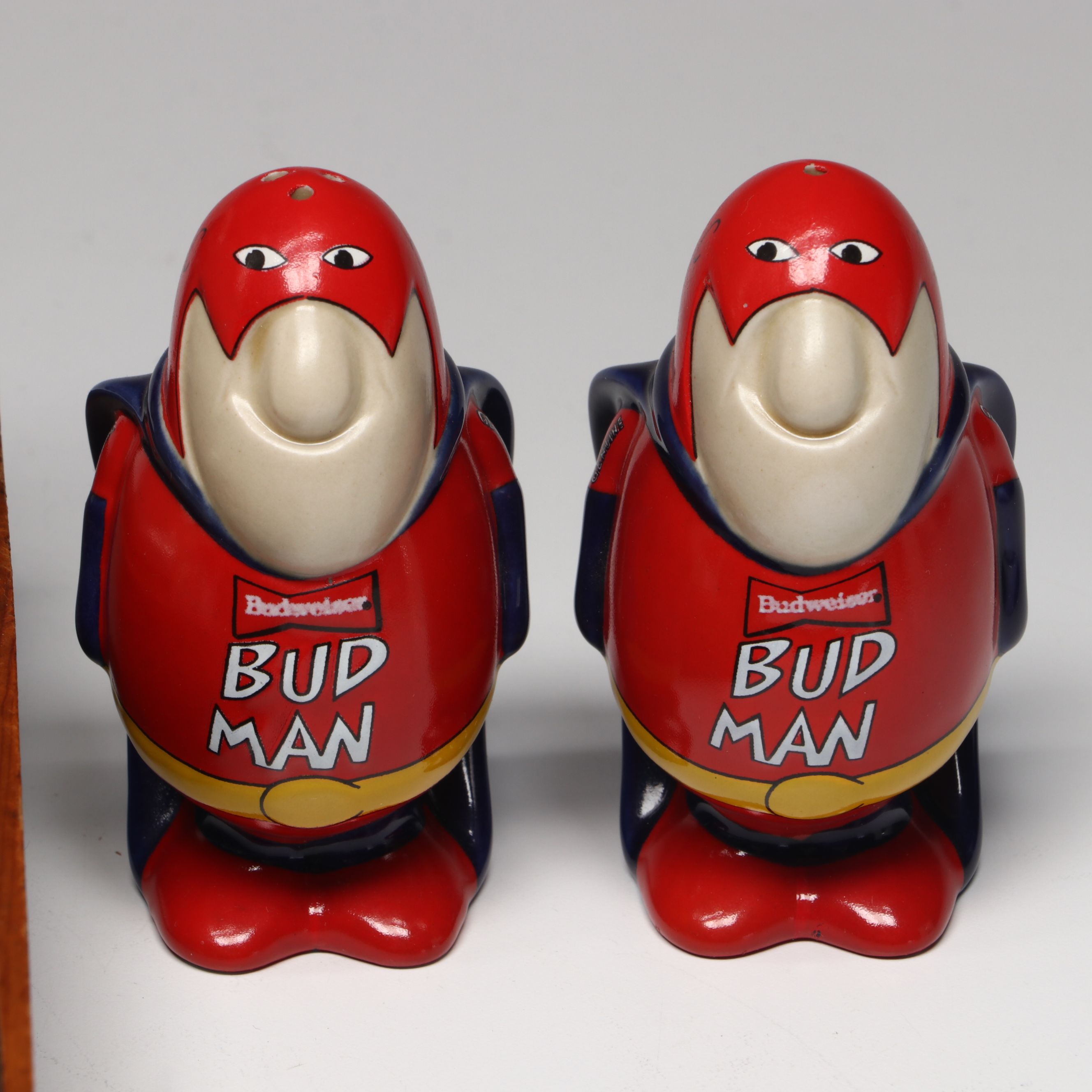 Collection of Glass, Porcelain, and More Shakers with Ceramic Table Trivet