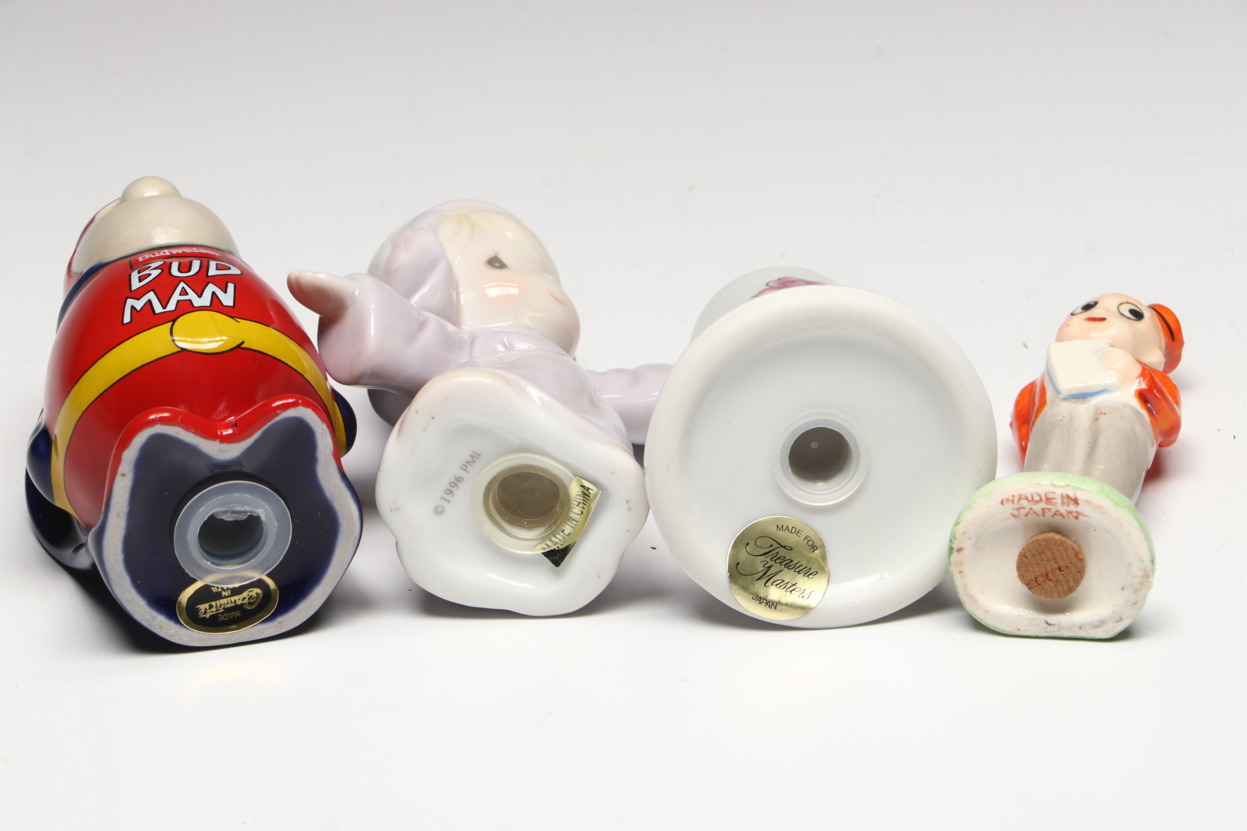 Collection of Glass, Porcelain, and More Shakers with Ceramic Table Trivet