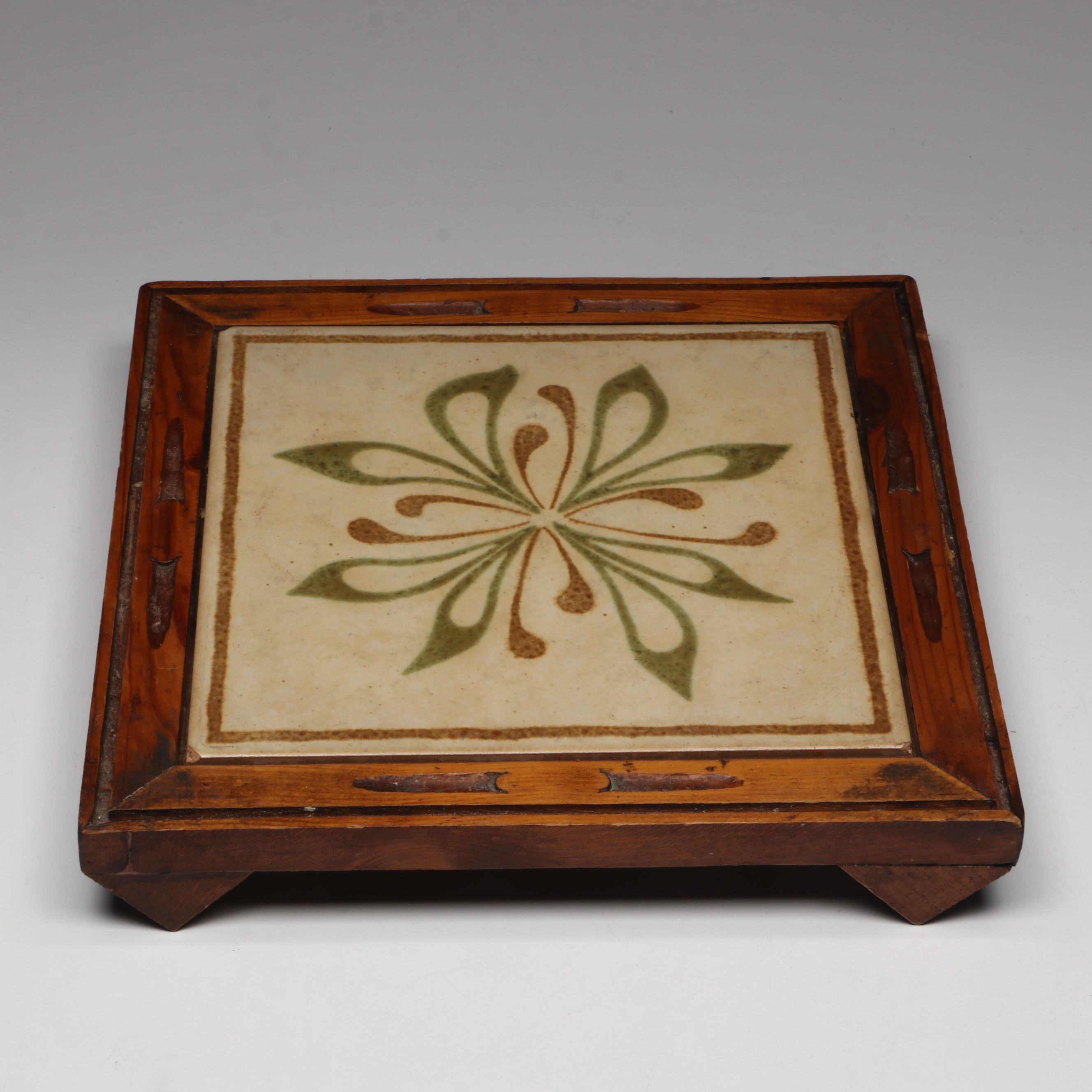 Collection of Glass, Porcelain, and More Shakers with Ceramic Table Trivet