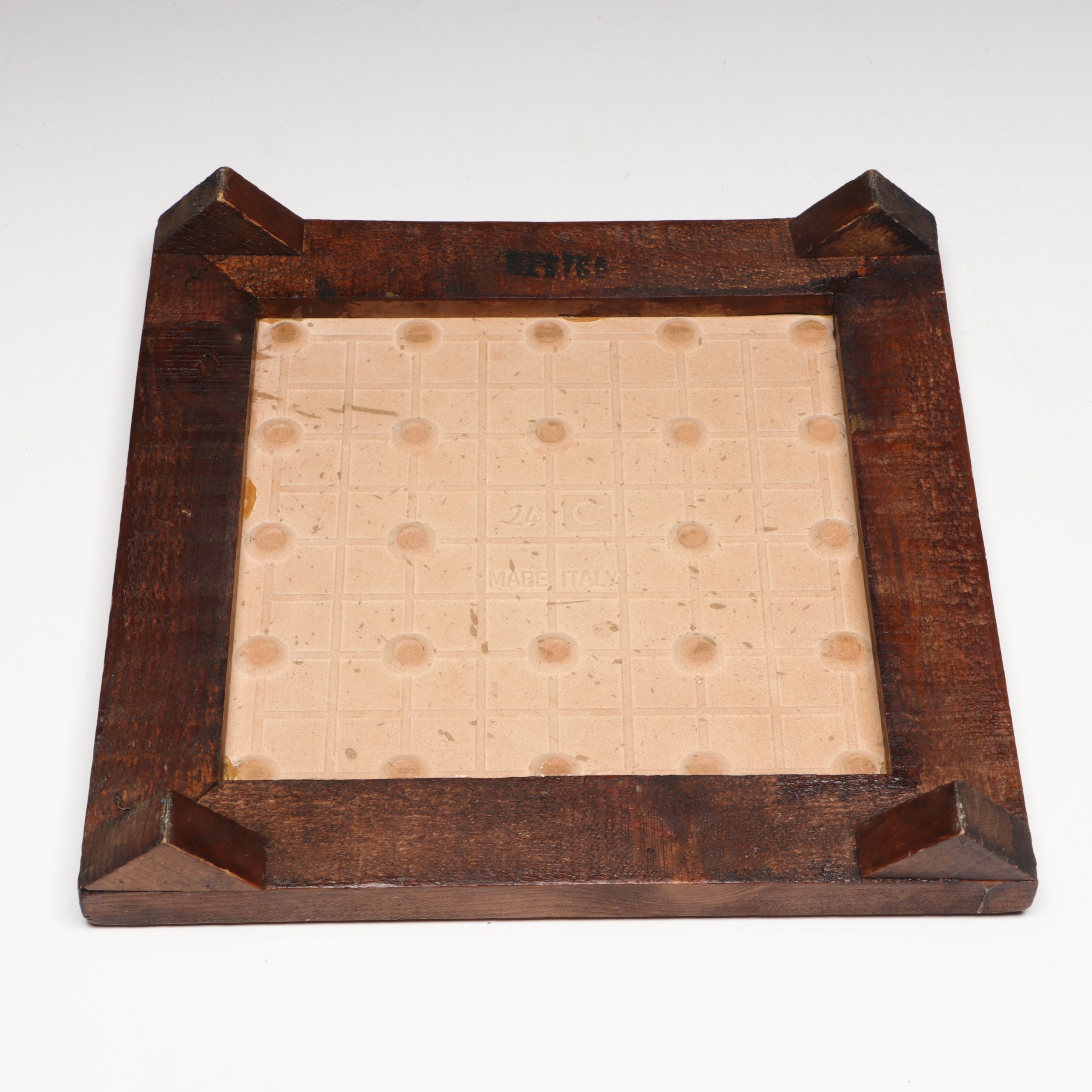 Collection of Glass, Porcelain, and More Shakers with Ceramic Table Trivet