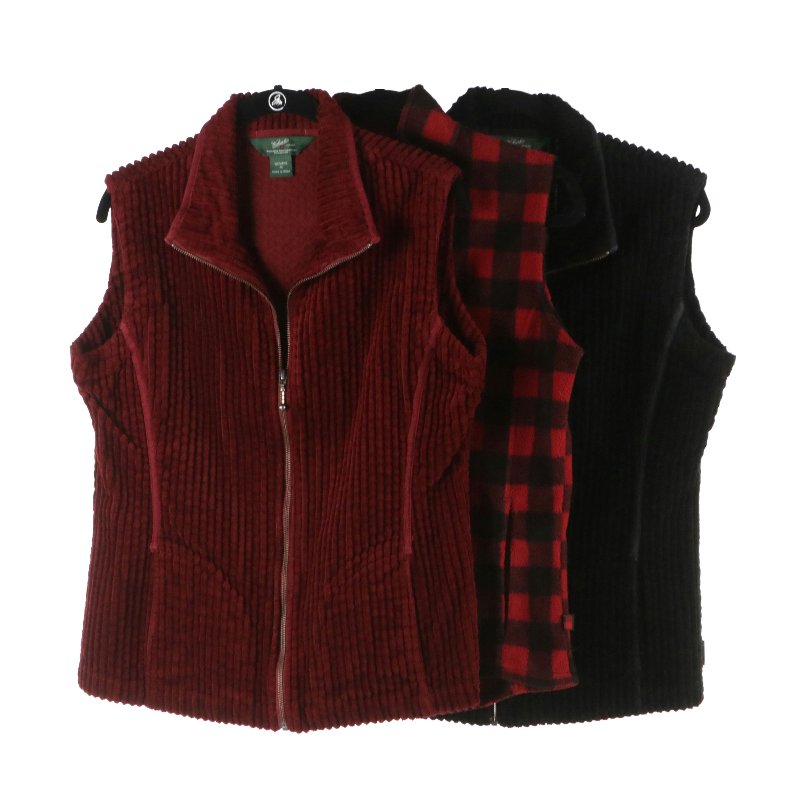 Woolrich Zip Vests in Black, Deep Ruby, and Buffalo Plaid