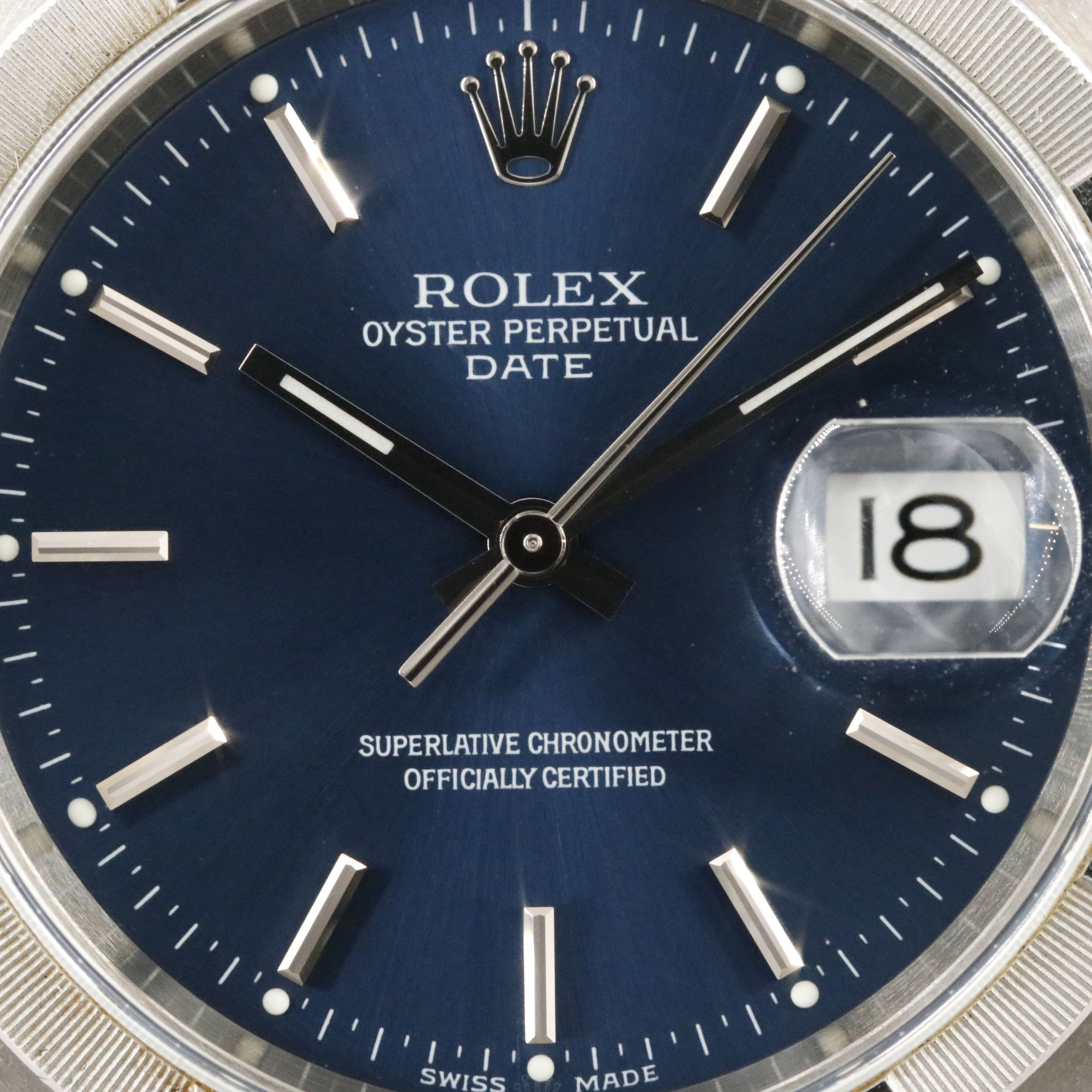 2002 Rolex Oyster Perpetual Engine Turned Bezel Blue Dial Date Ref. 15210 Watch