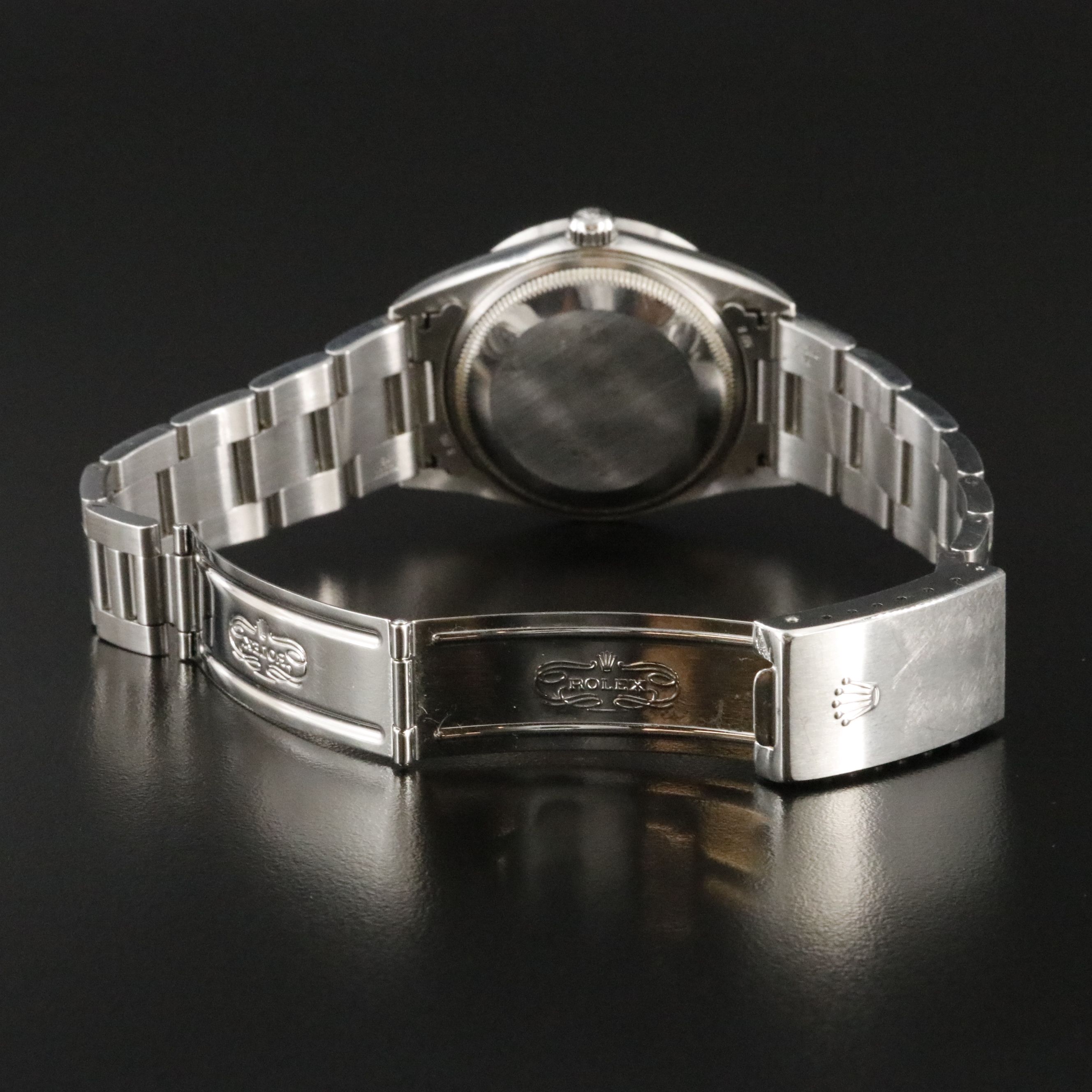 2002 Rolex Oyster Perpetual Engine Turned Bezel Blue Dial Date Ref. 15210 Watch