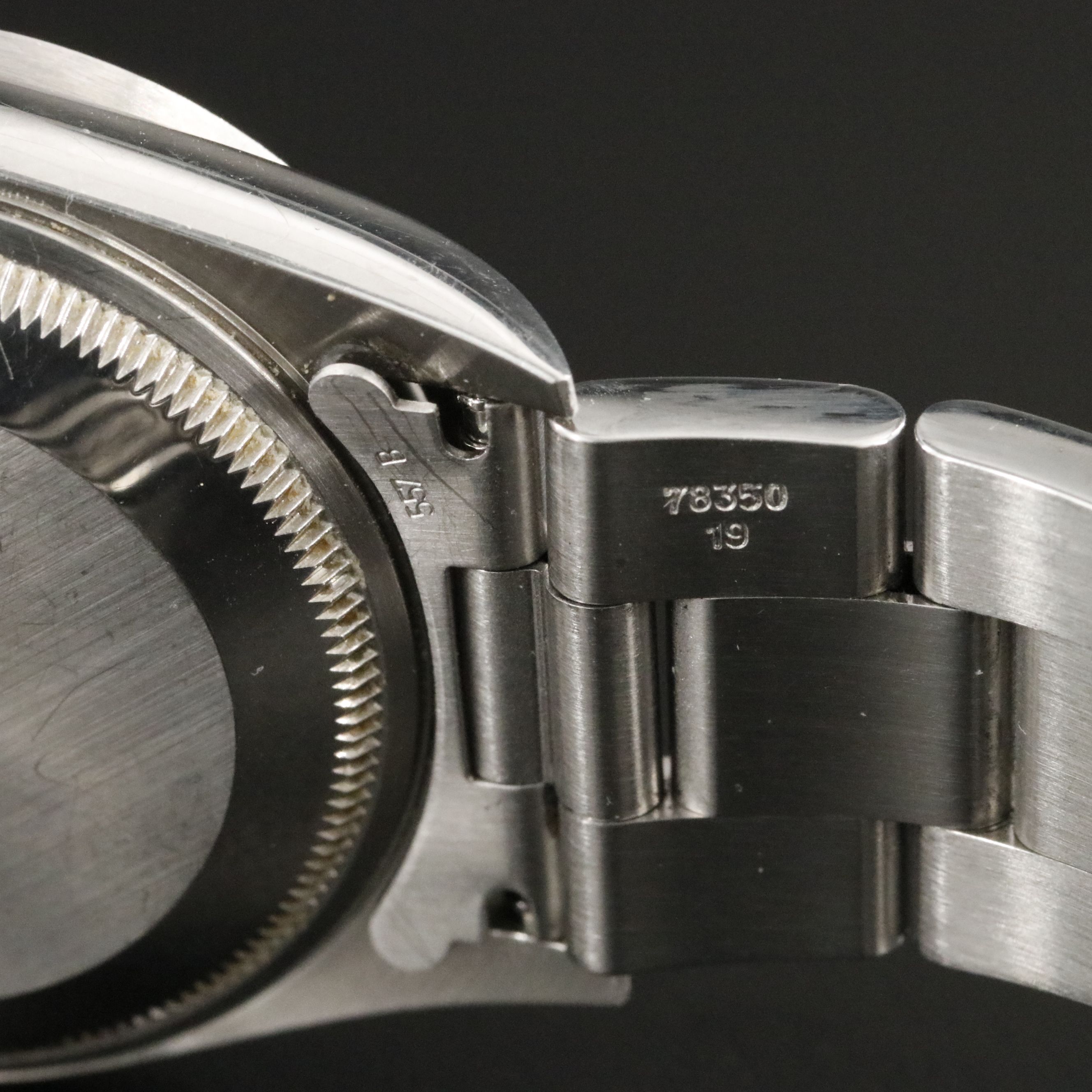 2002 Rolex Oyster Perpetual Engine Turned Bezel Blue Dial Date Ref. 15210 Watch