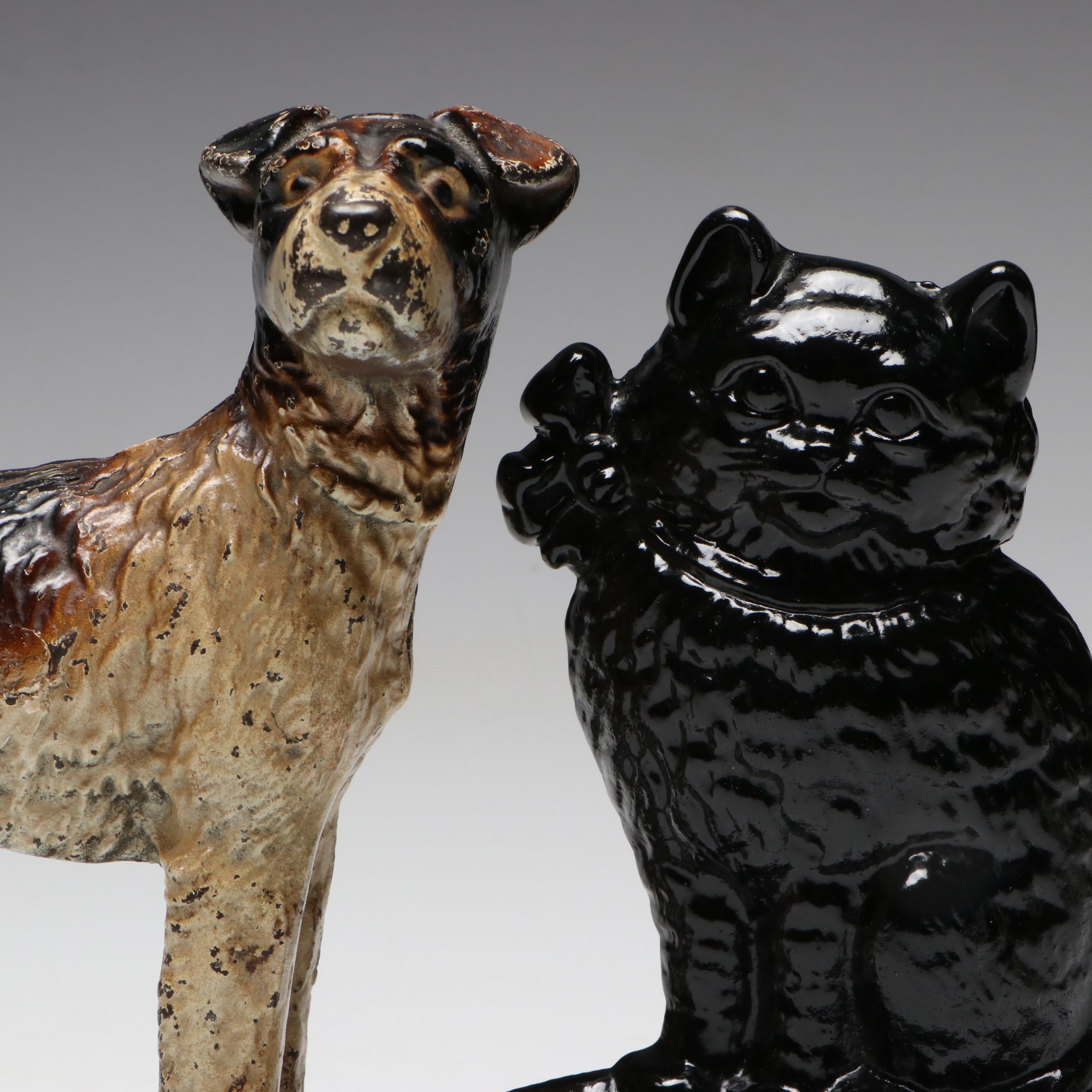 Painted Cast Iron Terrier Dog and Sitting Cat Doorstops, Early to Mid-20th C.