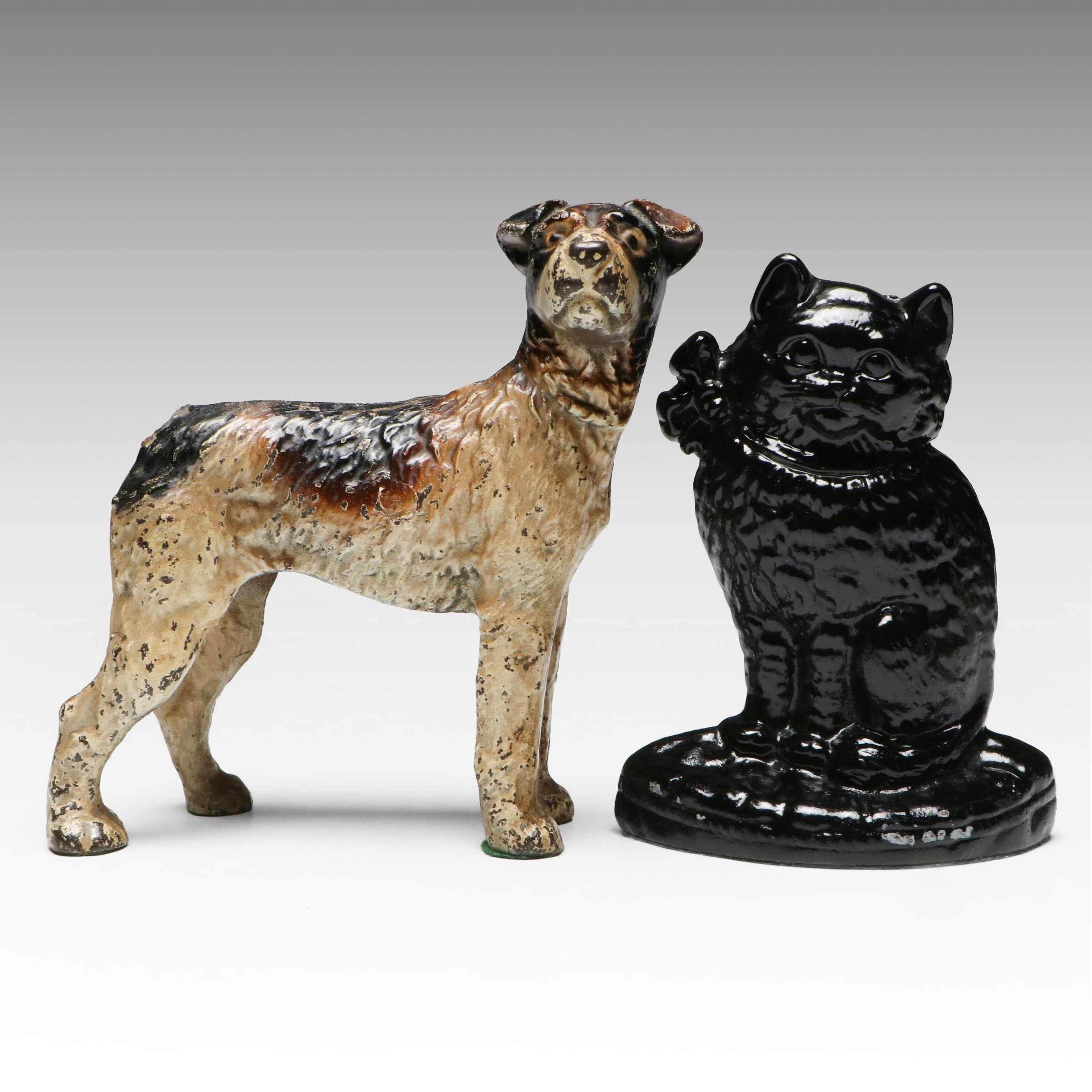 Painted Cast Iron Terrier Dog and Sitting Cat Doorstops, Early to Mid-20th C.