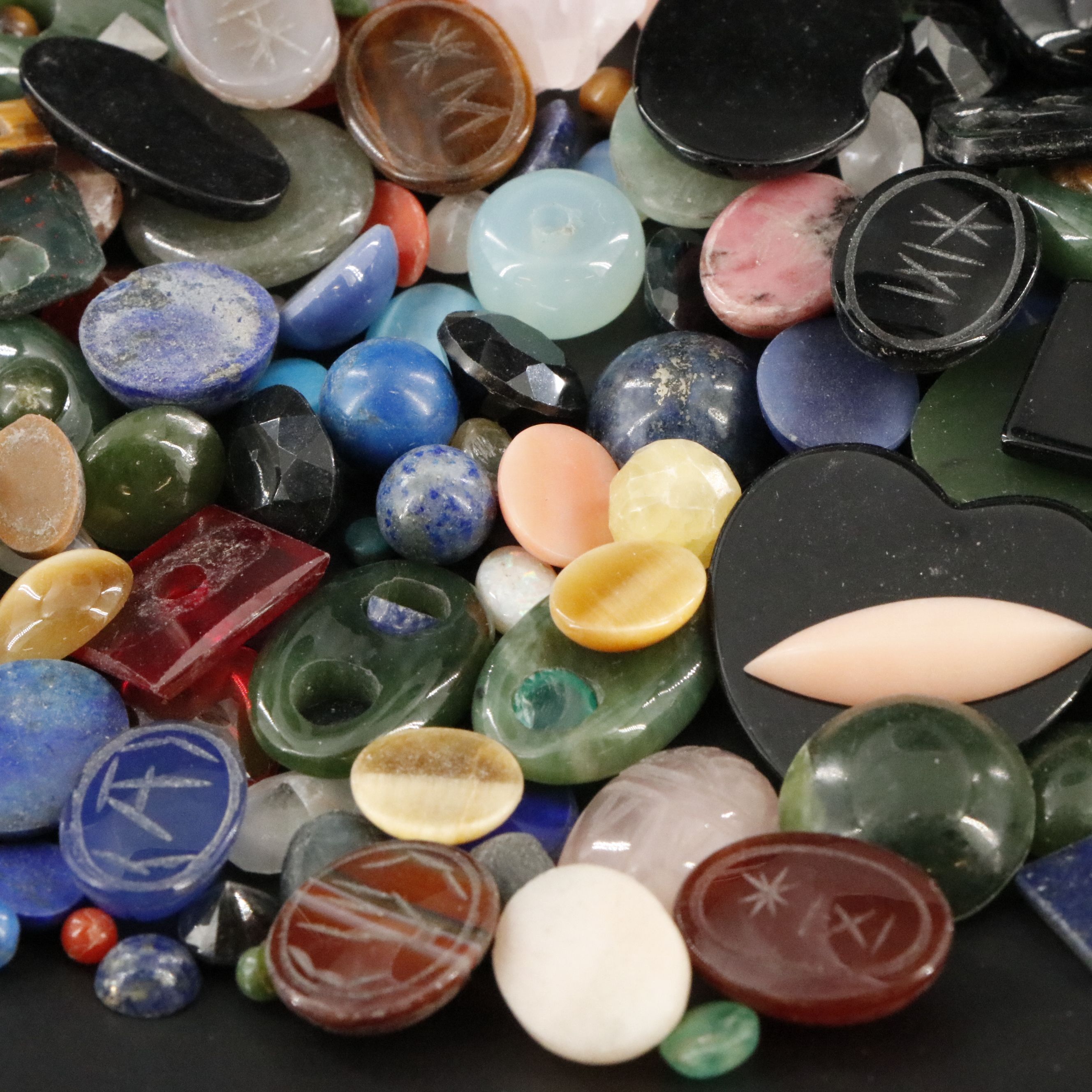 Loose Gemstone Lot Including Tiger's Eye, Rhodochrosite and Coral