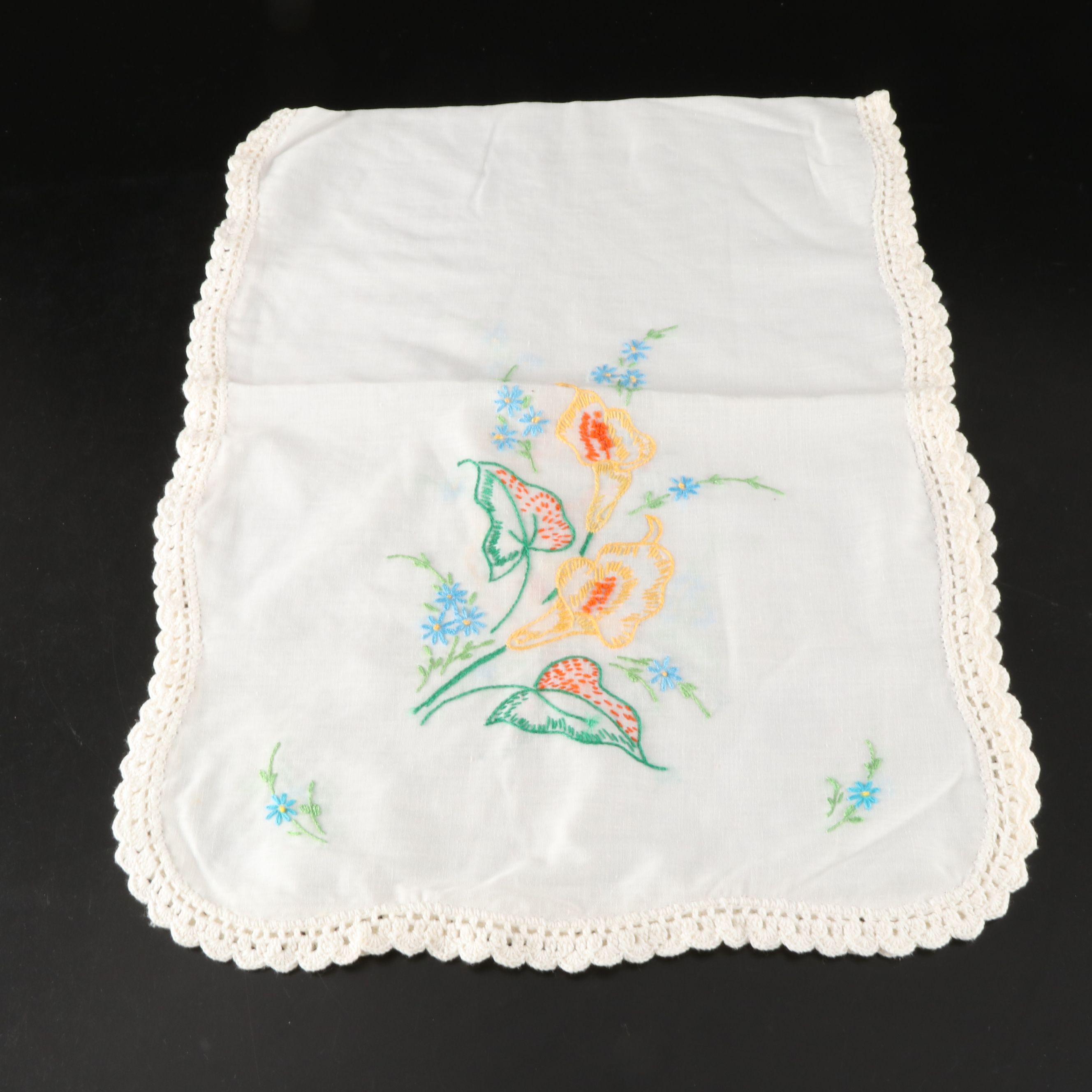 Embroidered Star-Shaped Doilies, Daisy Table Runner, and More Table Linens