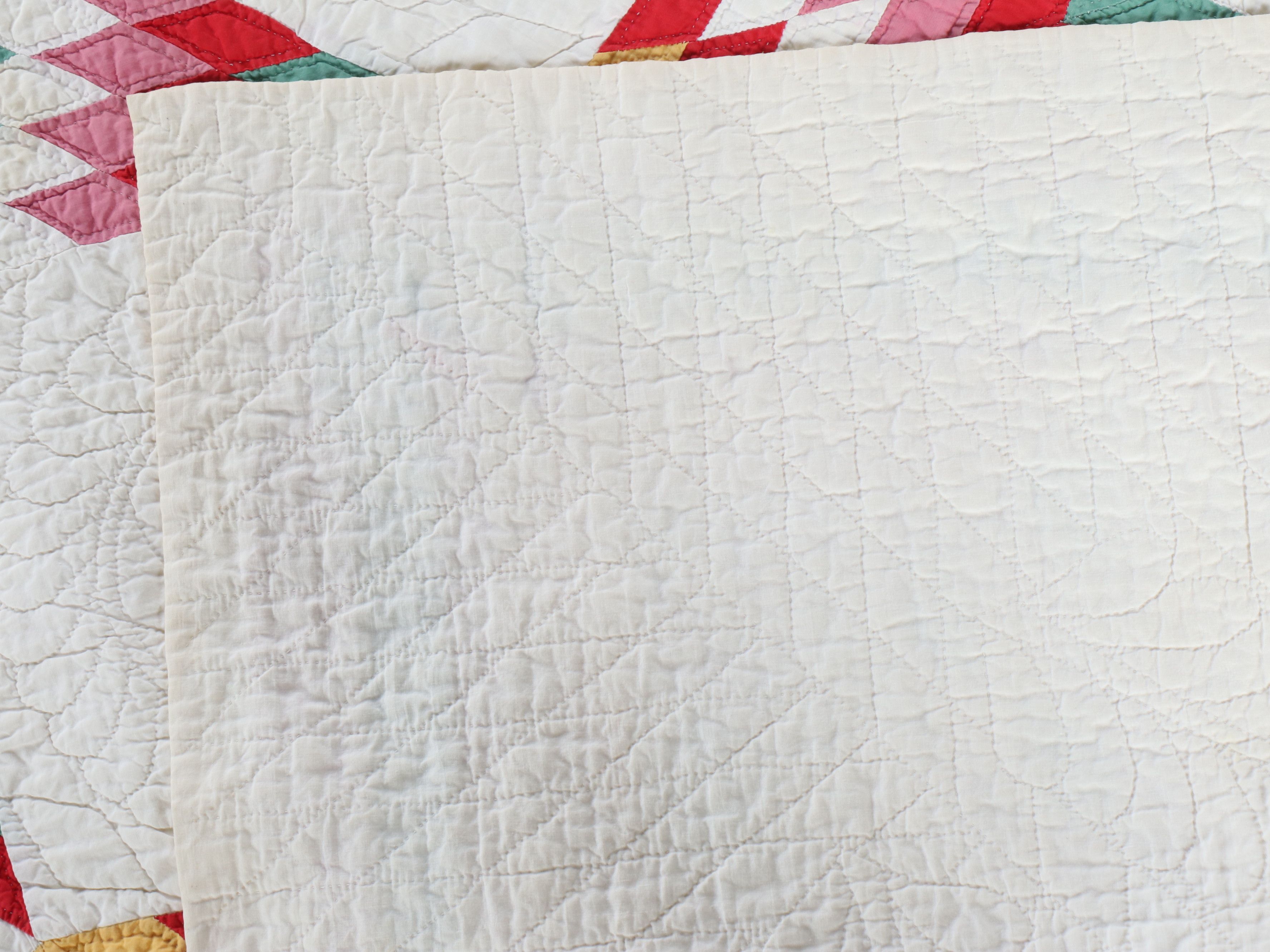 Hand-Pieced "Broken Lone Star" Multicolor Cotton Quilt, 20th Century