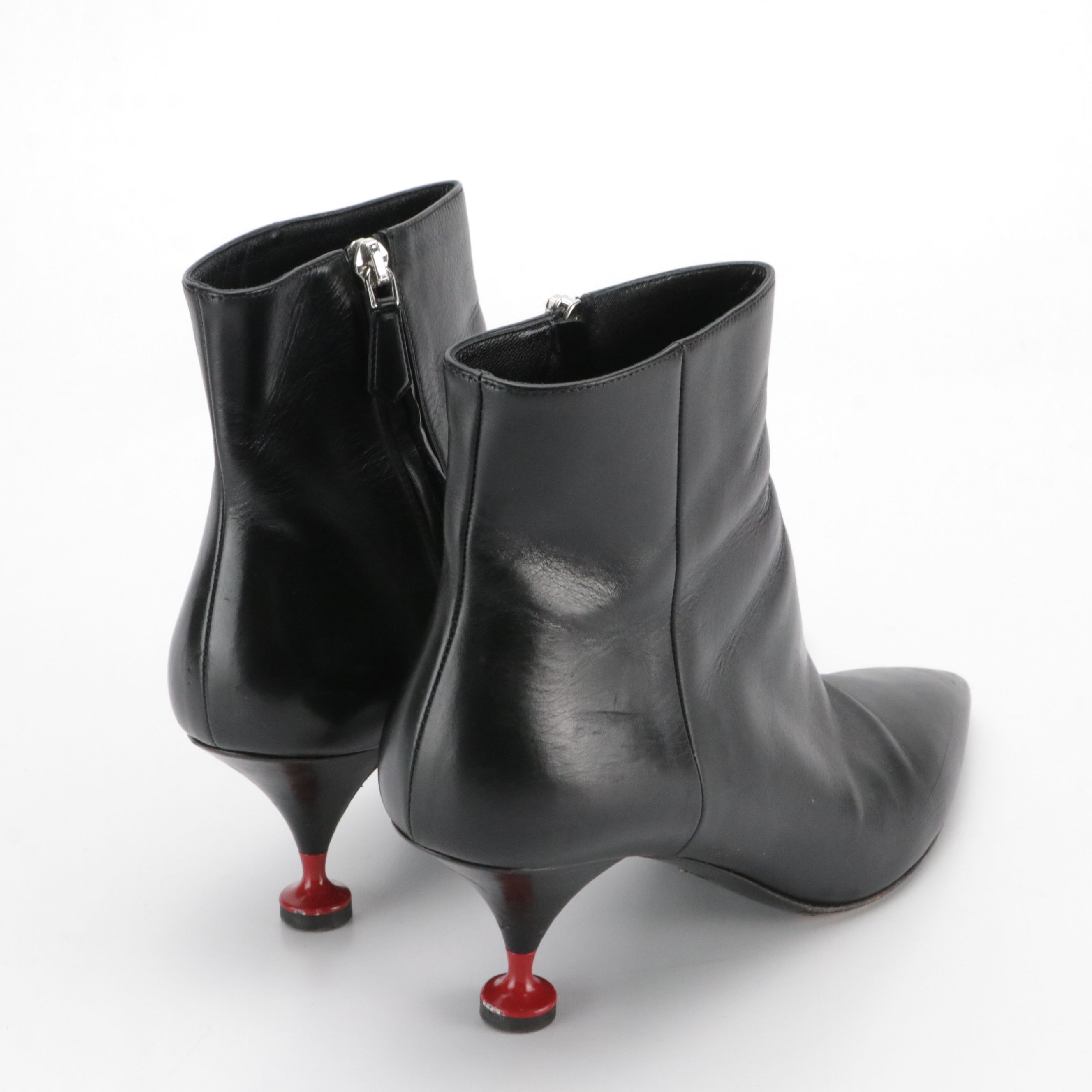 Prada Pointed-Toe Booties in Black Leather with Red Accents