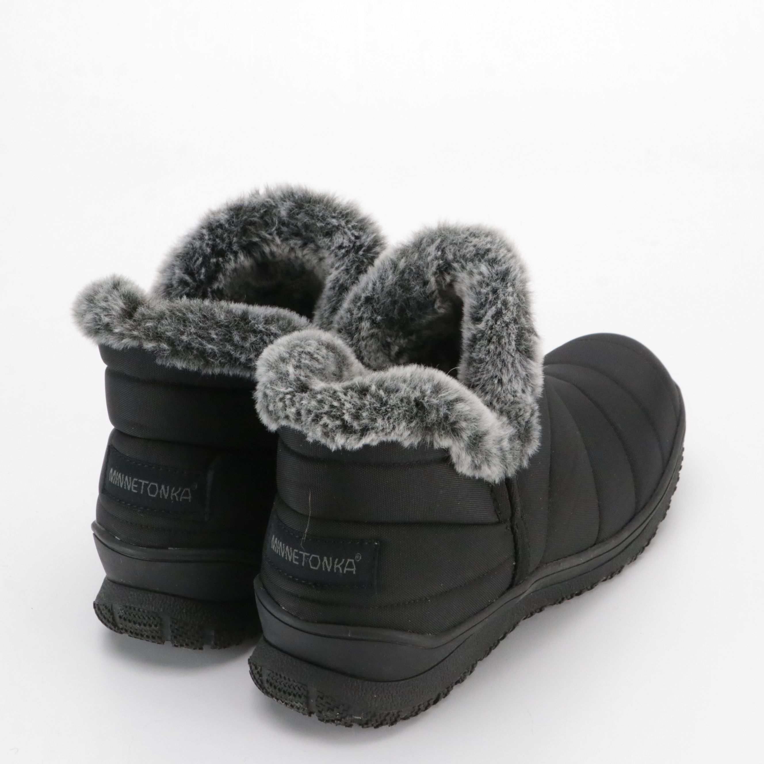Minnetonka "Northtown" Faux Fur Lined Booties in Black Nylon