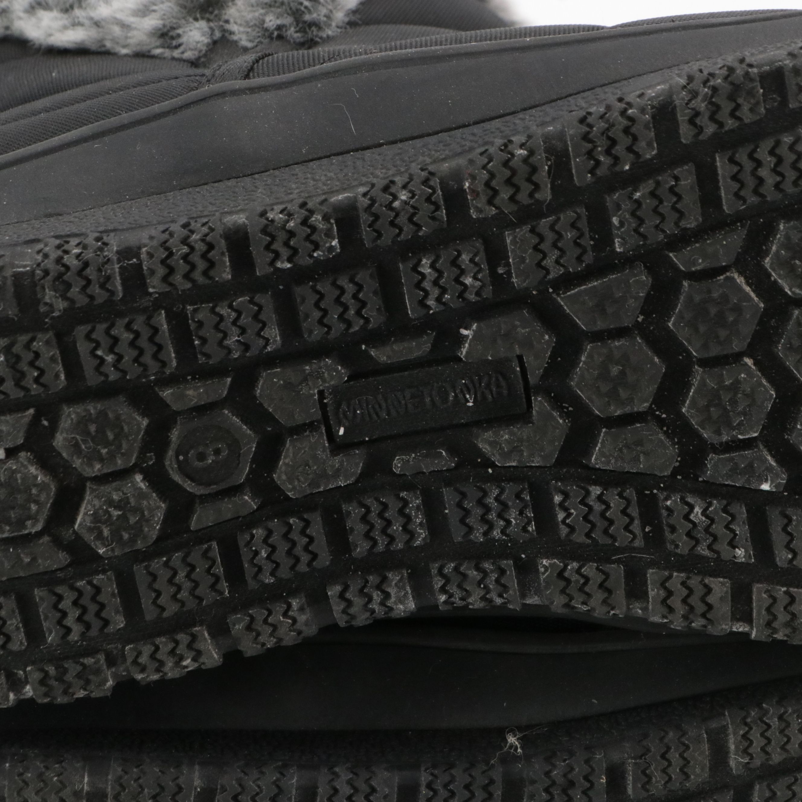 Minnetonka "Northtown" Faux Fur Lined Booties in Black Nylon