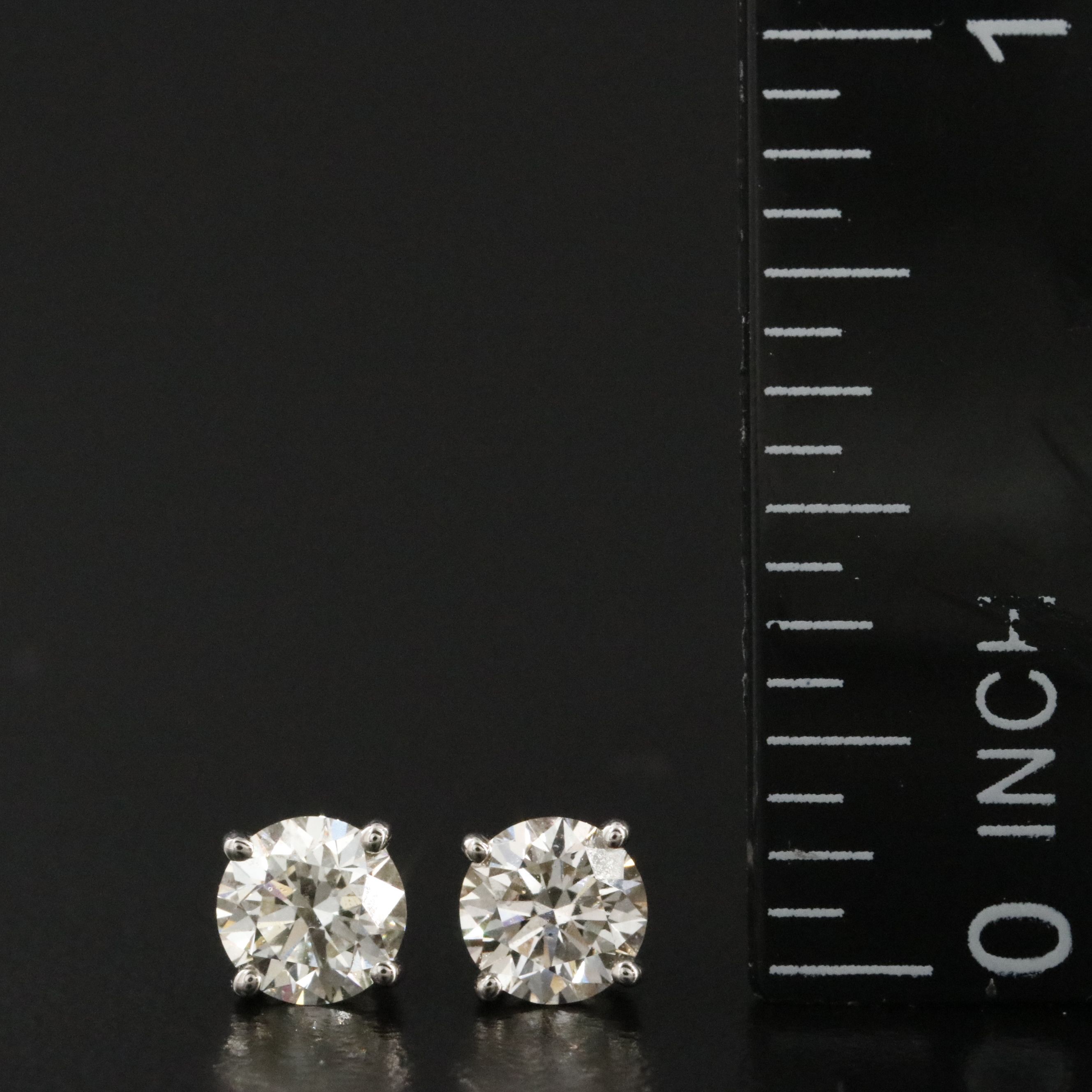 Platinum 1.02 CTW Diamond Stud Earrings with GIA Report