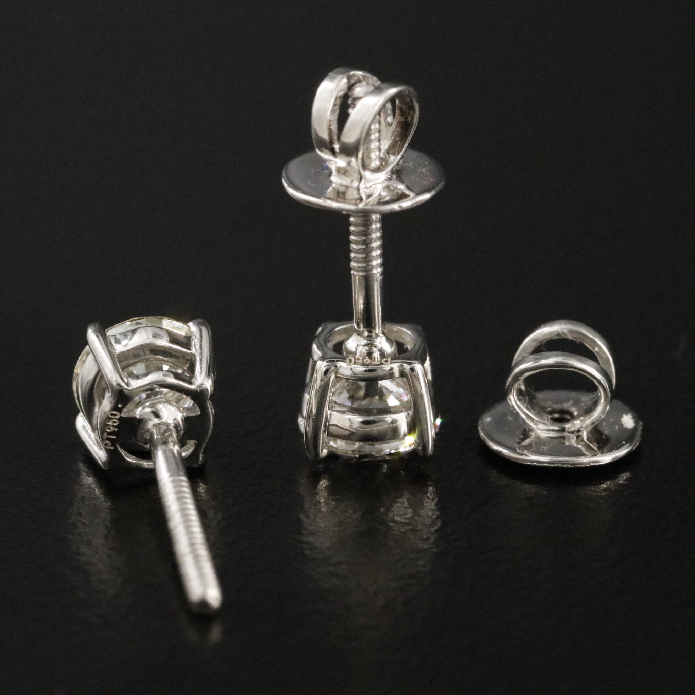 Platinum 1.02 CTW Diamond Stud Earrings with GIA Report
