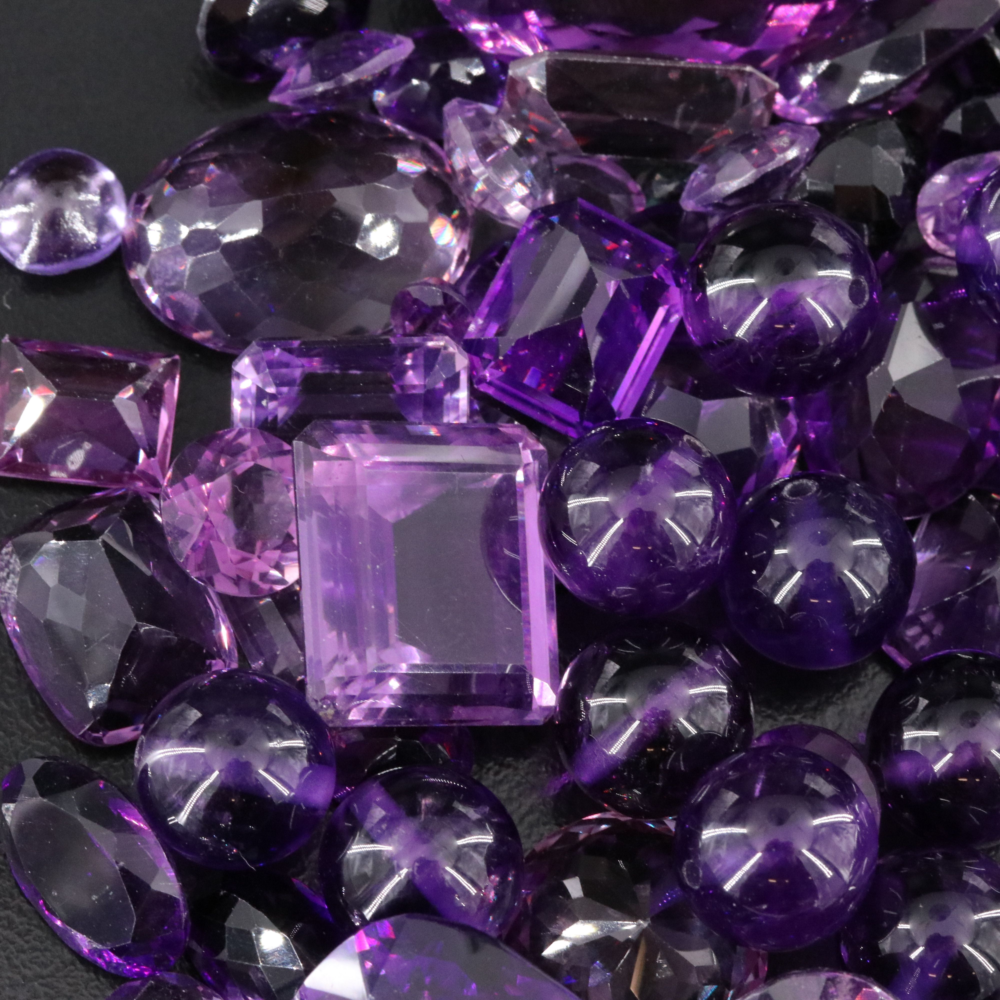 Loose 807.50 CTW Gemstone Lot Including Amethyst and Garnet