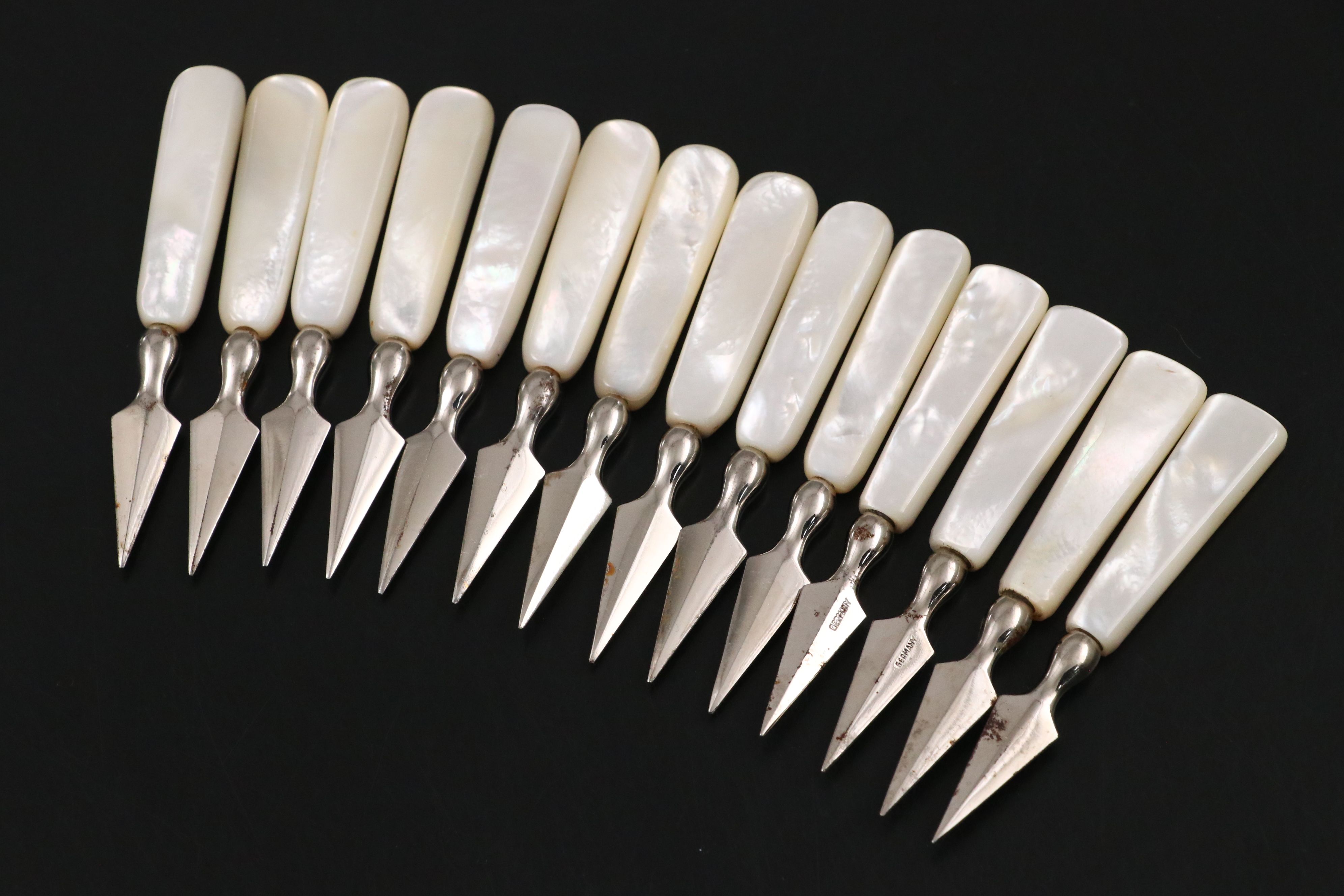 Mother-of-Pearl Handled Flatware and Coin Purses