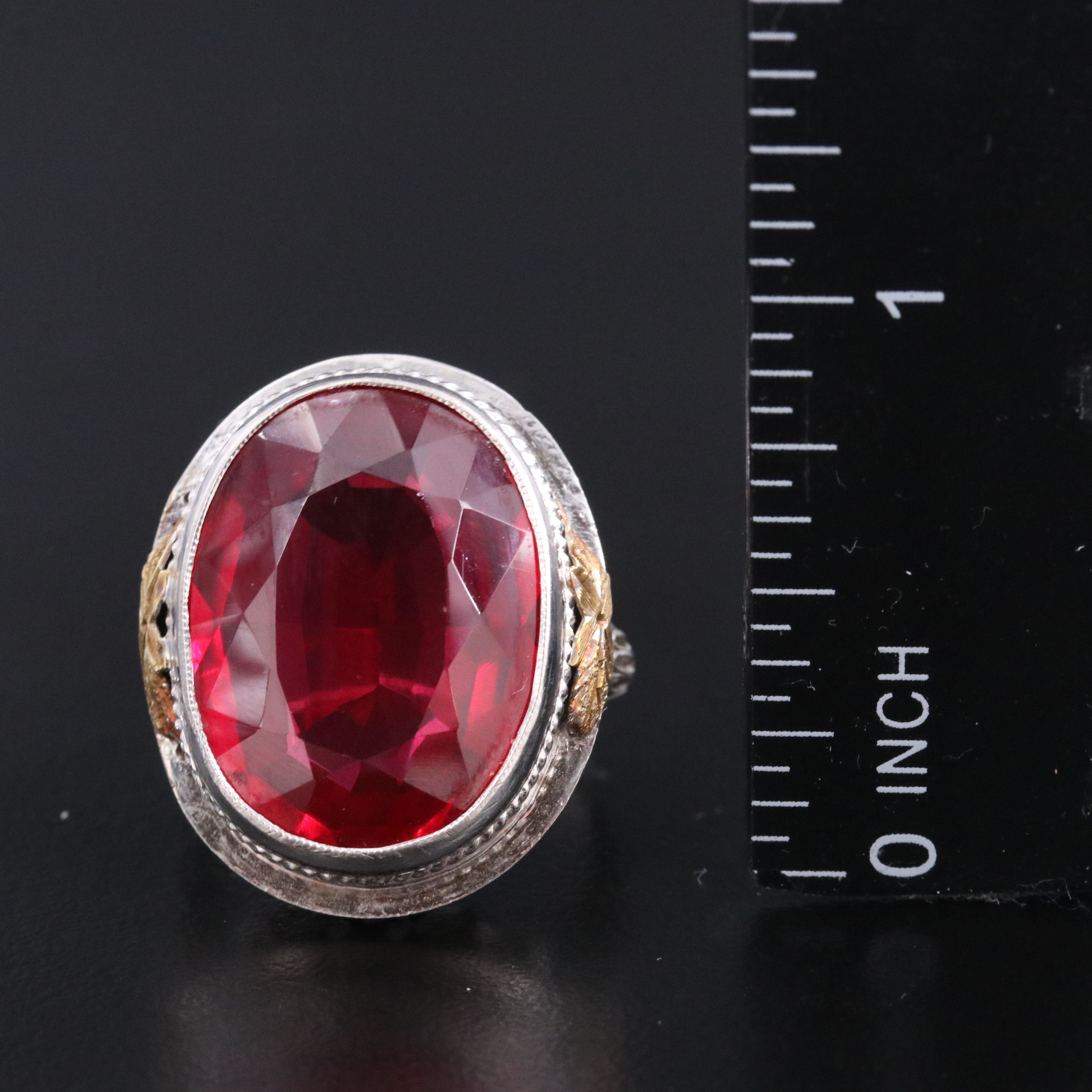 1930s 14K Ruby Filigree Ring with Amphora and Floral Motifs