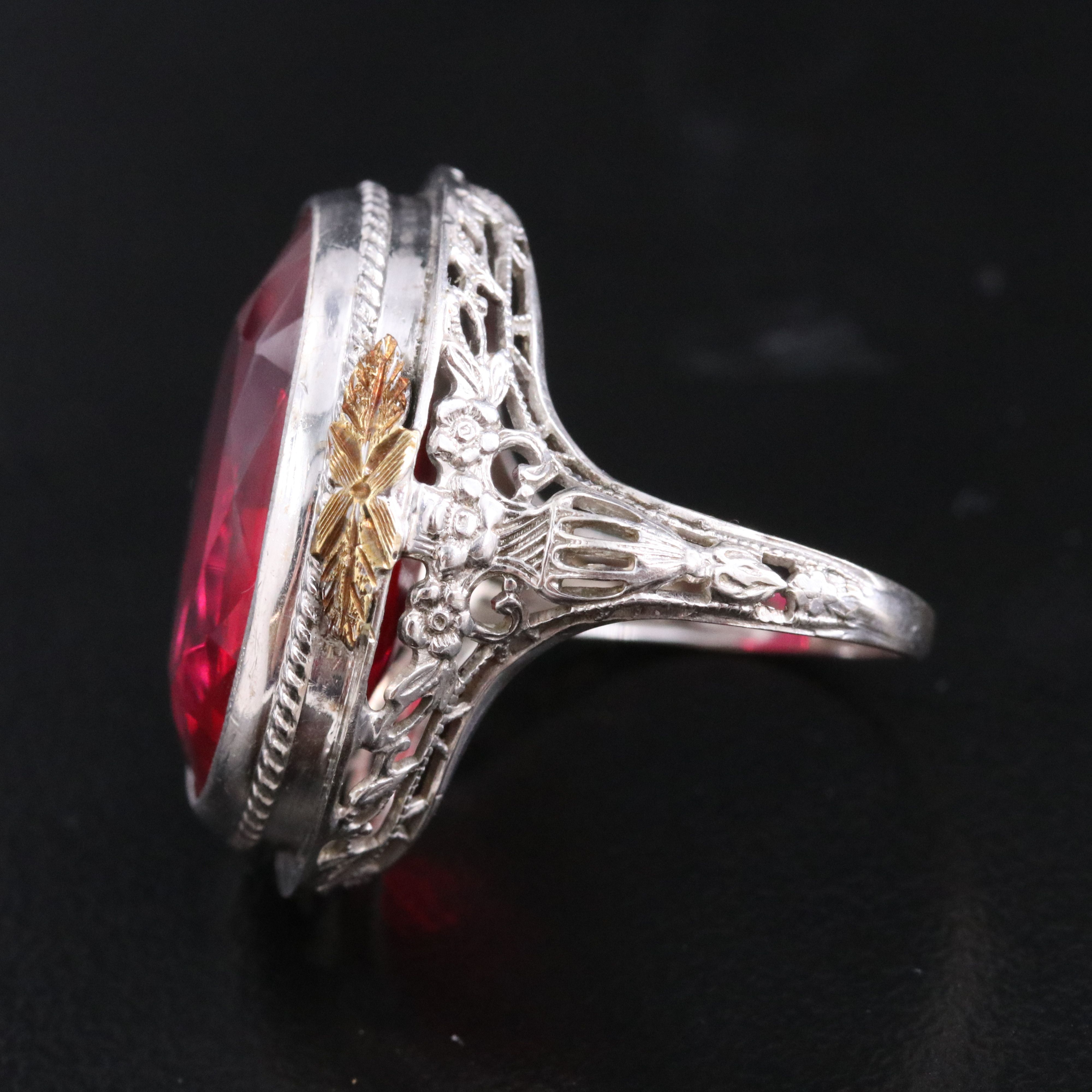 1930s 14K Ruby Filigree Ring with Amphora and Floral Motifs