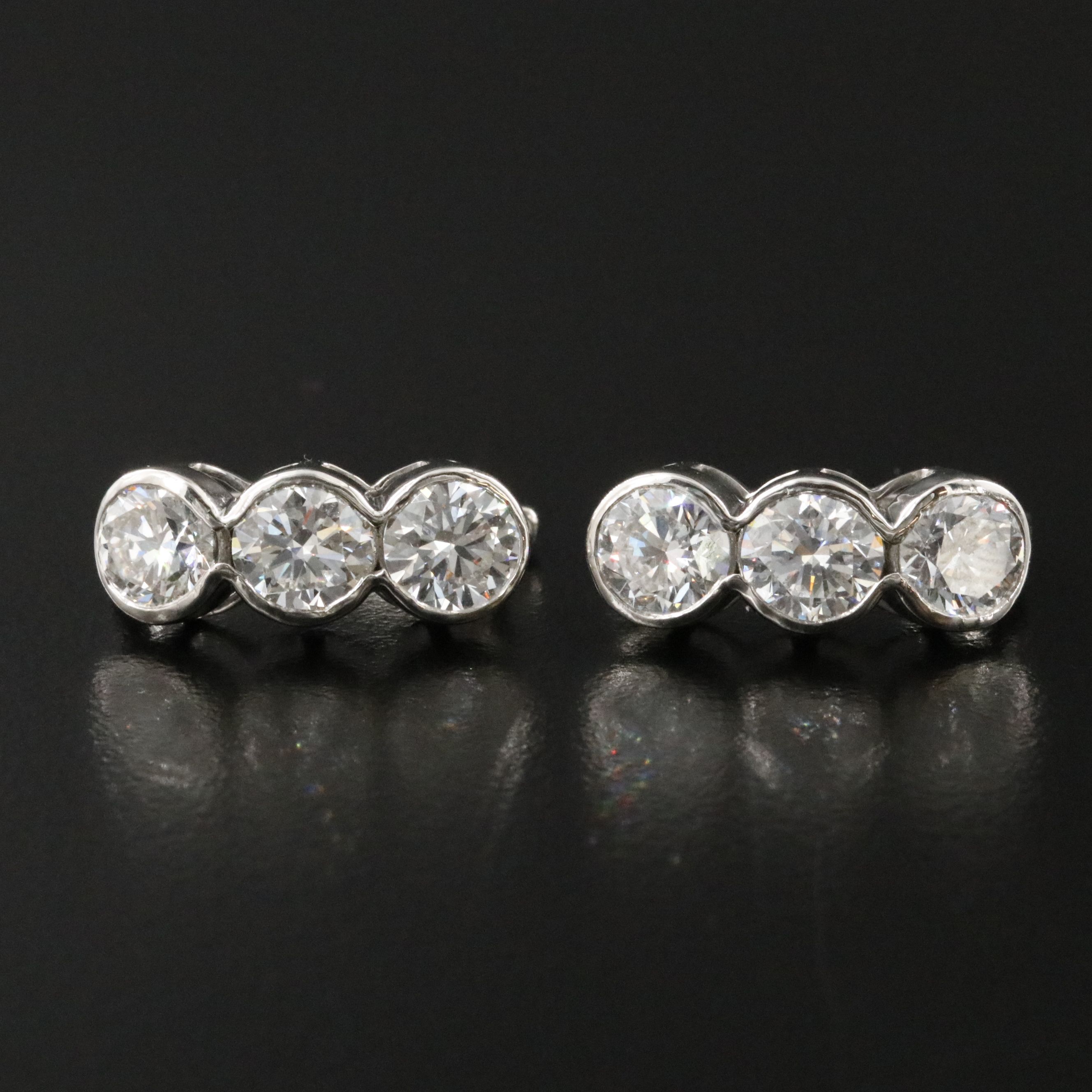 Platinum 5.94 CTW Lab Grown Diamond Earrings