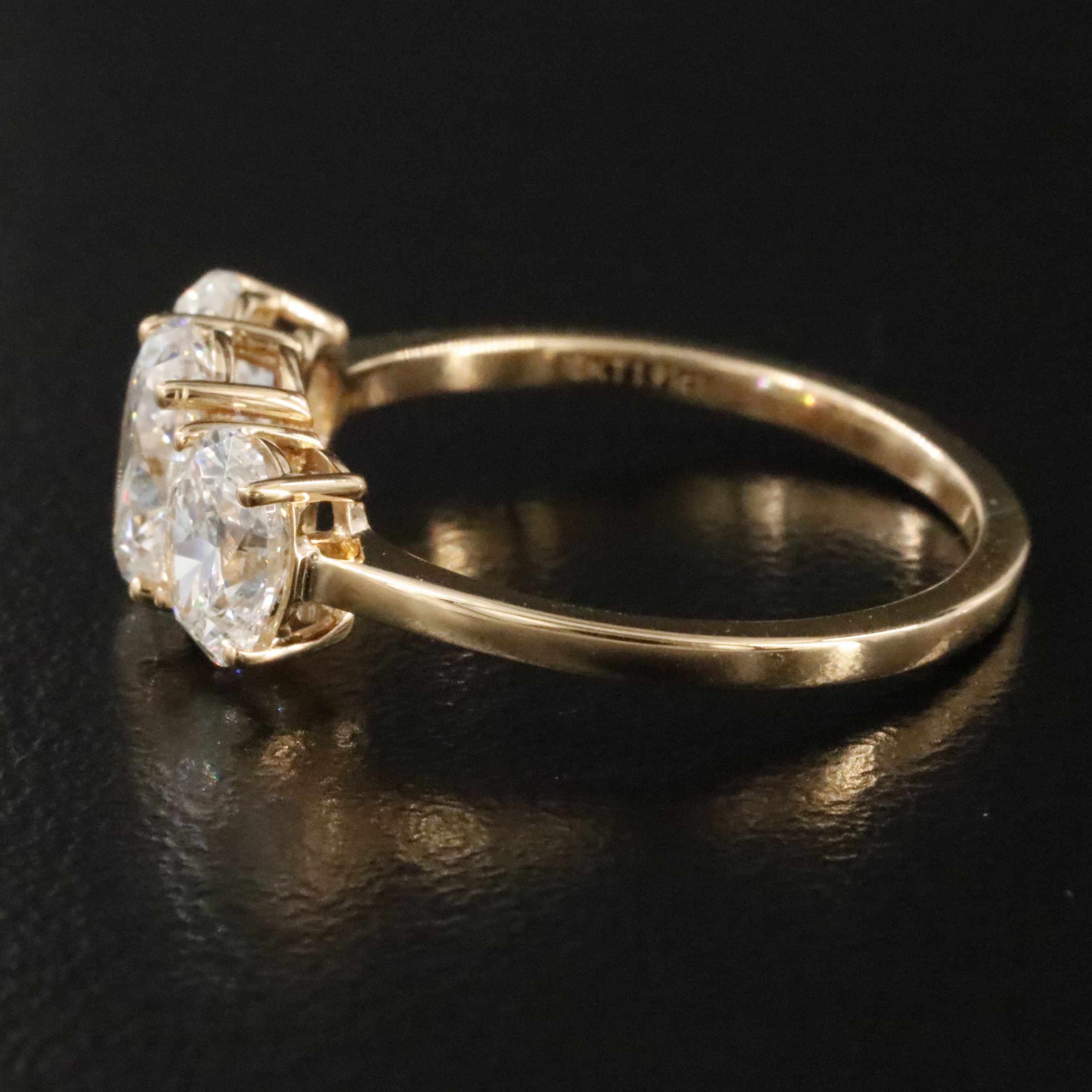 18K 1.91 CTW Diamond Three Stone Ring with GIA Reports