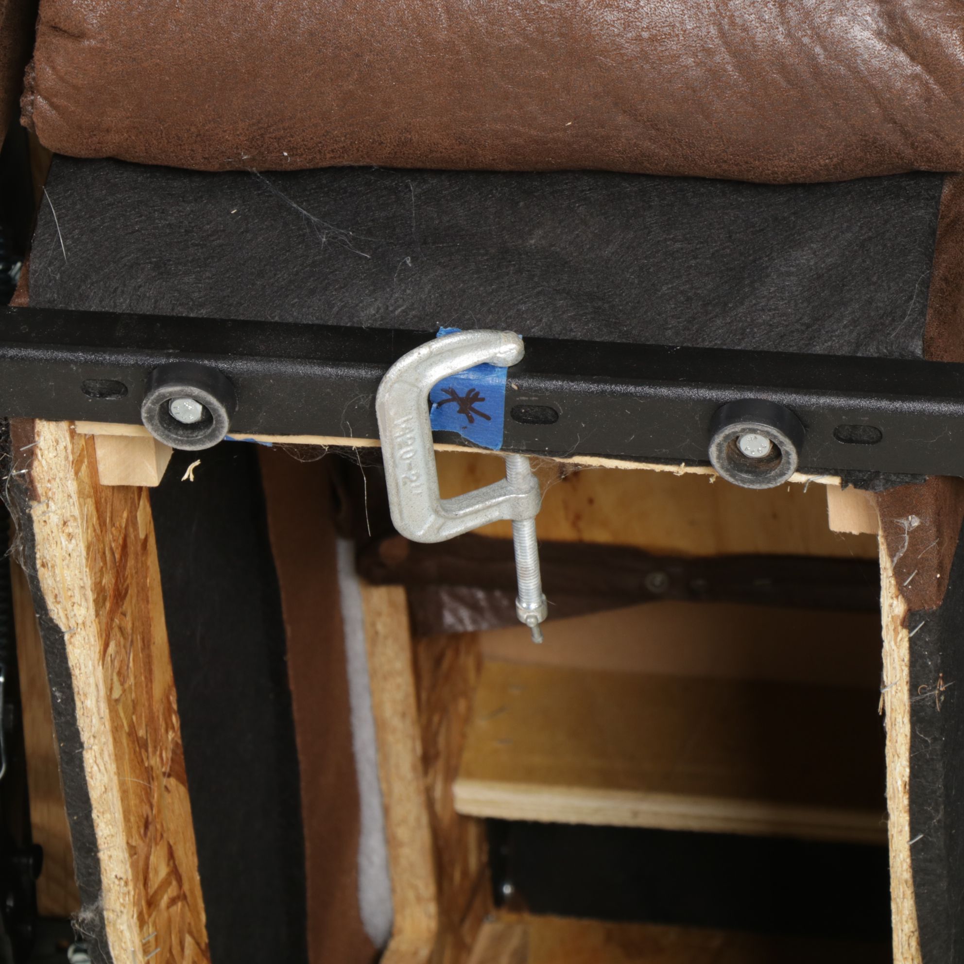 Mocha Suede Leather Dual-Reclining Loveseat with Cup Holders and Storage Console