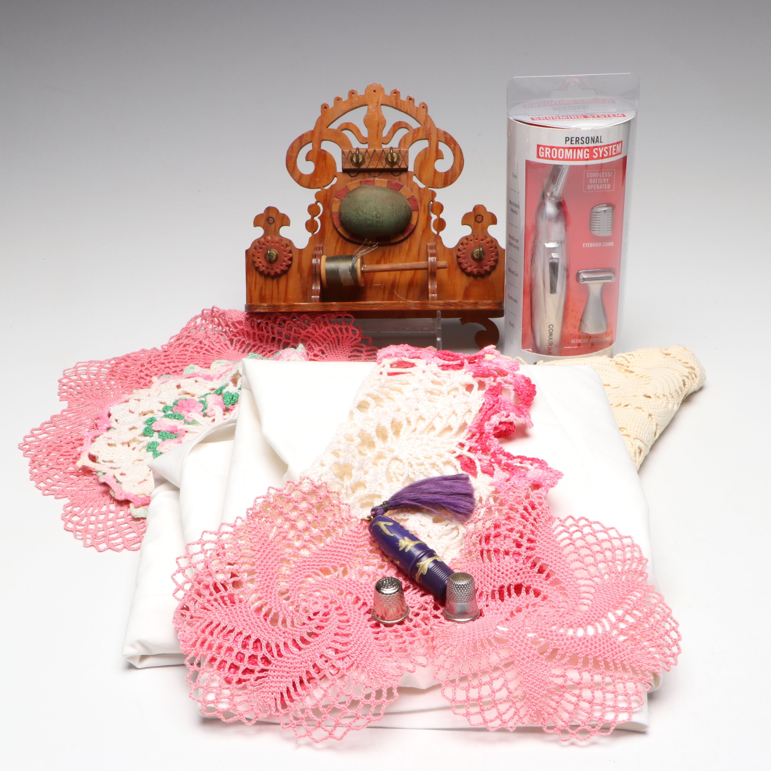 Wood Sewing Rack and Hand-Embroidered Pillowcases with Doilies and Trimmer