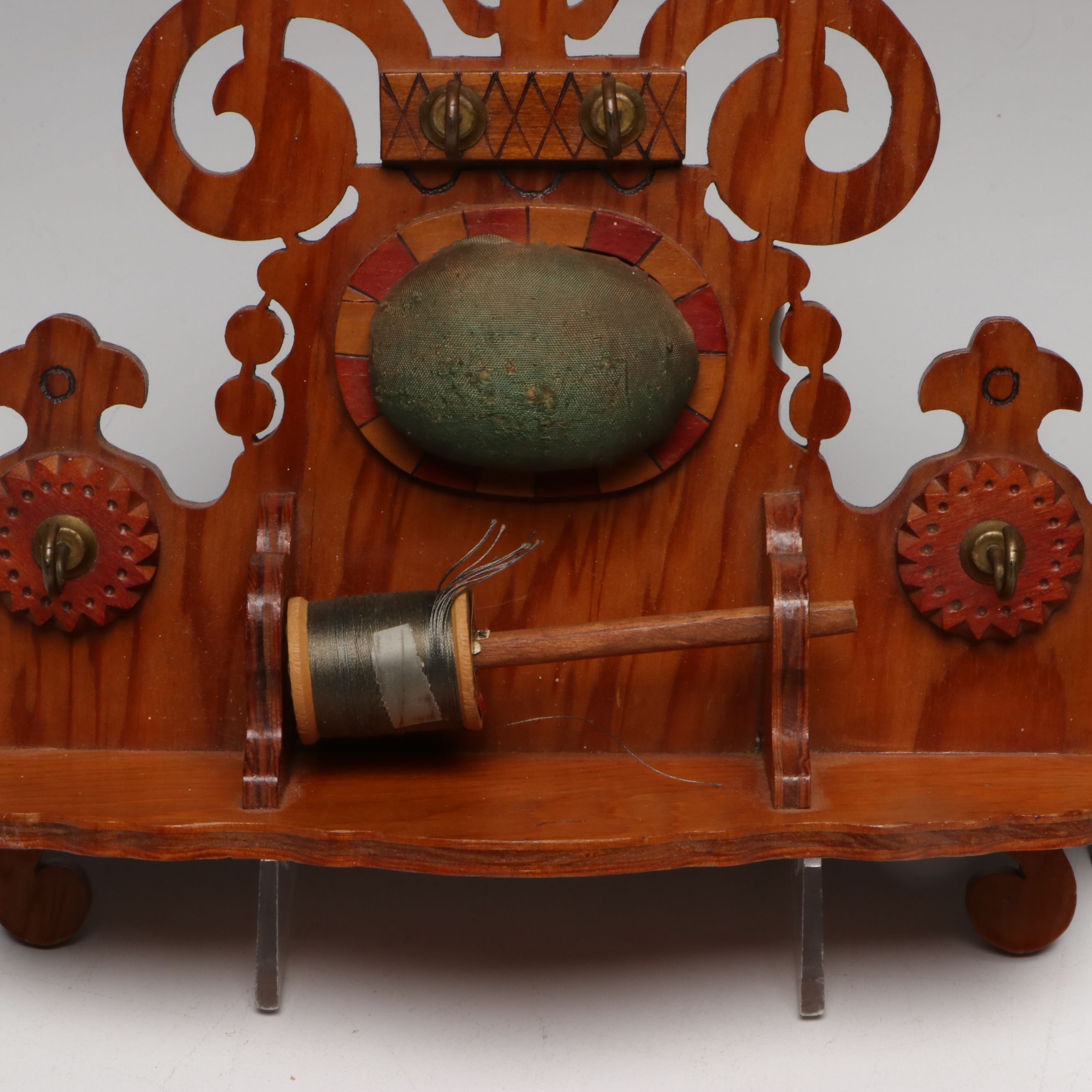 Wood Sewing Rack and Hand-Embroidered Pillowcases with Doilies and Trimmer