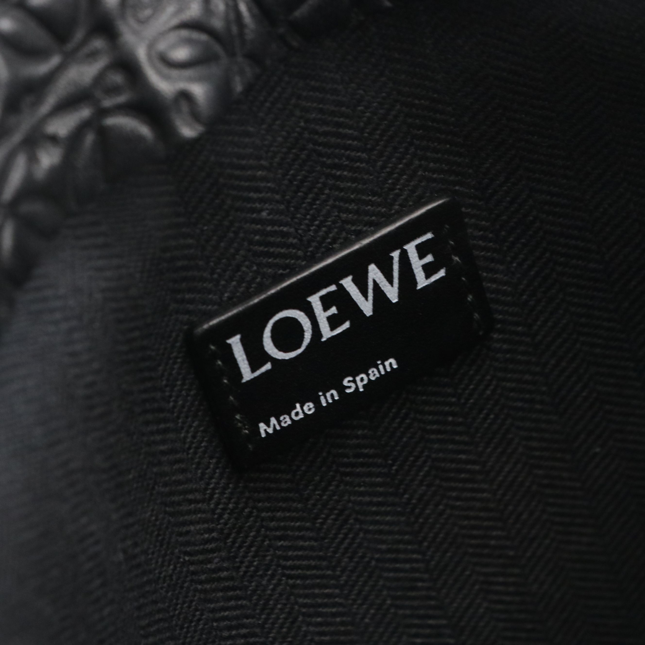 Loewe Repeat T Pouch in Black Anagram Embossed Leather