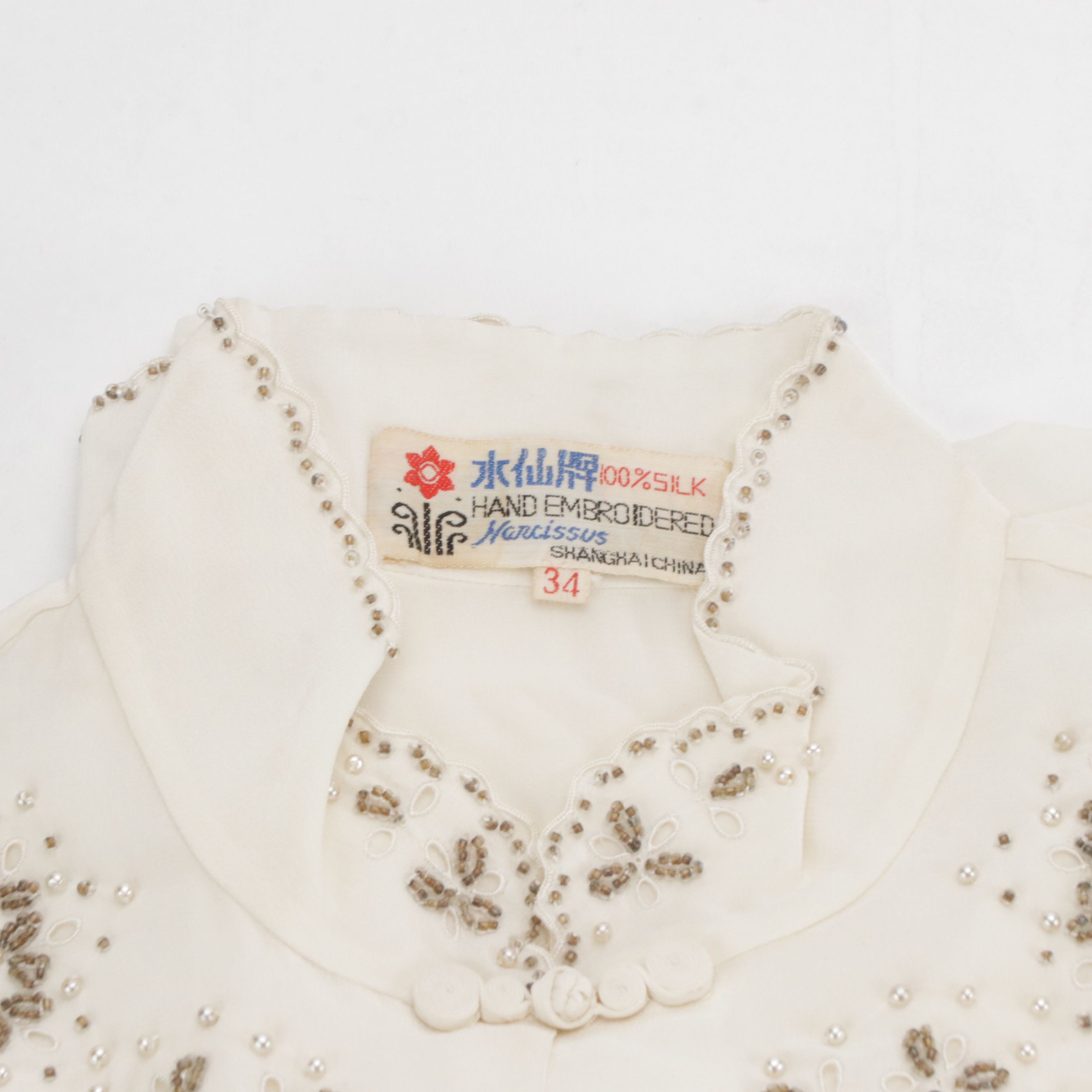 Begonia, Bai Hua, and More Embroidered/Embellished Silk Tops