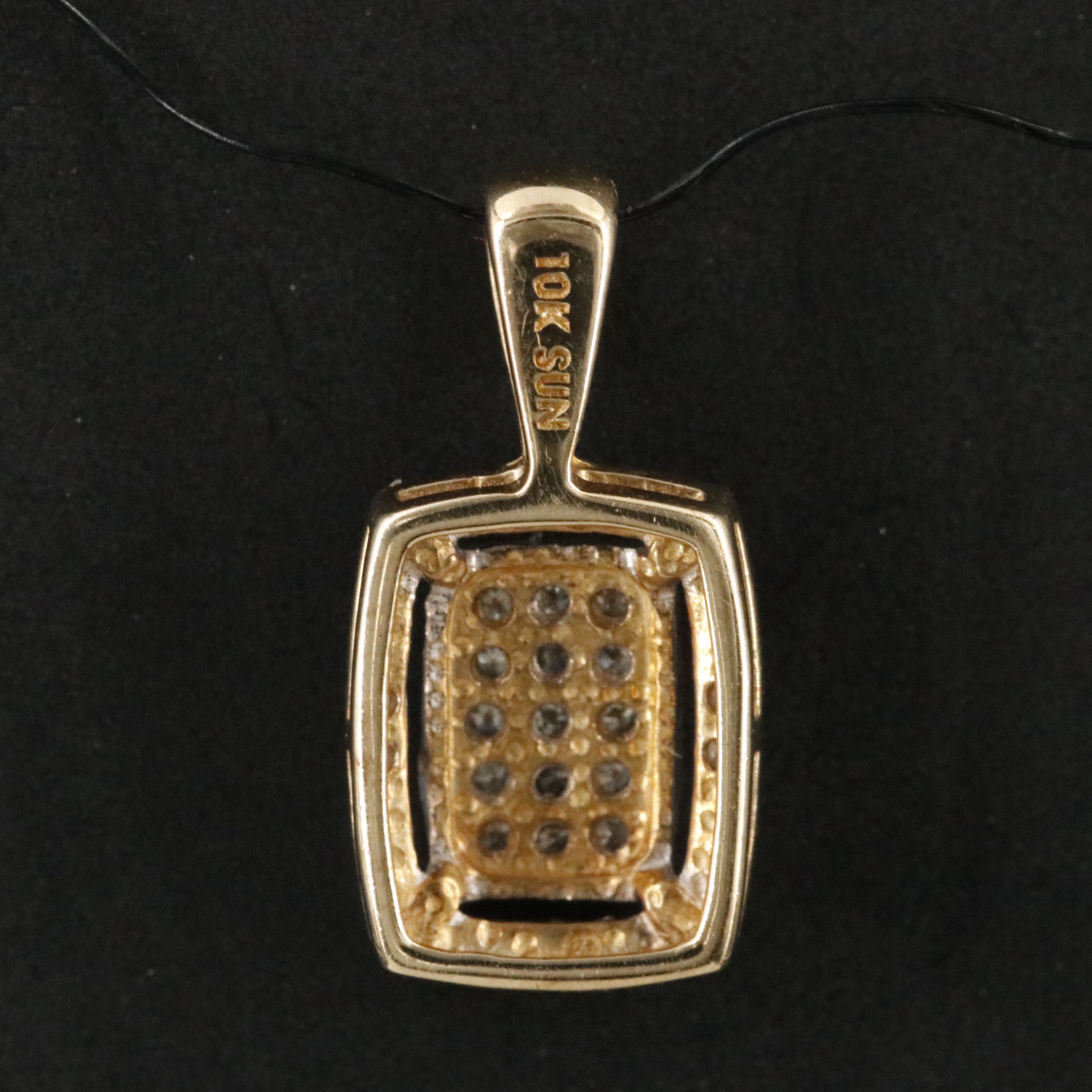 10K 0.07 CTW Diamond Pendant