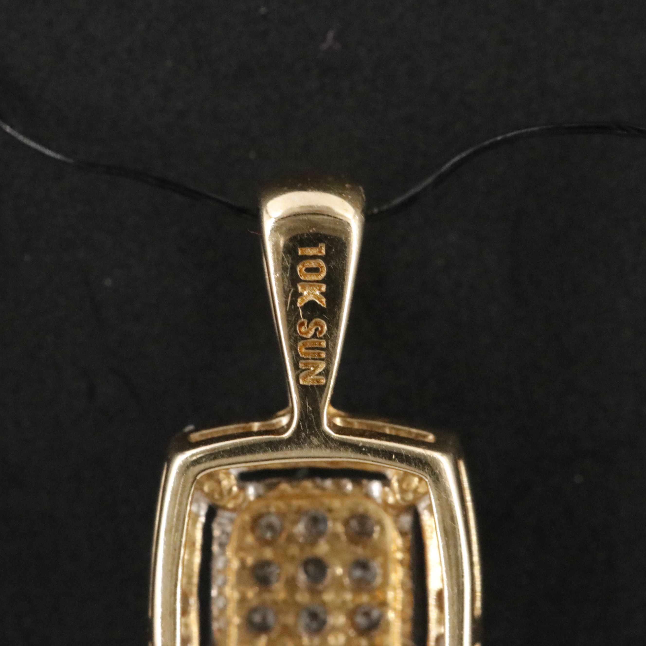 10K 0.07 CTW Diamond Pendant