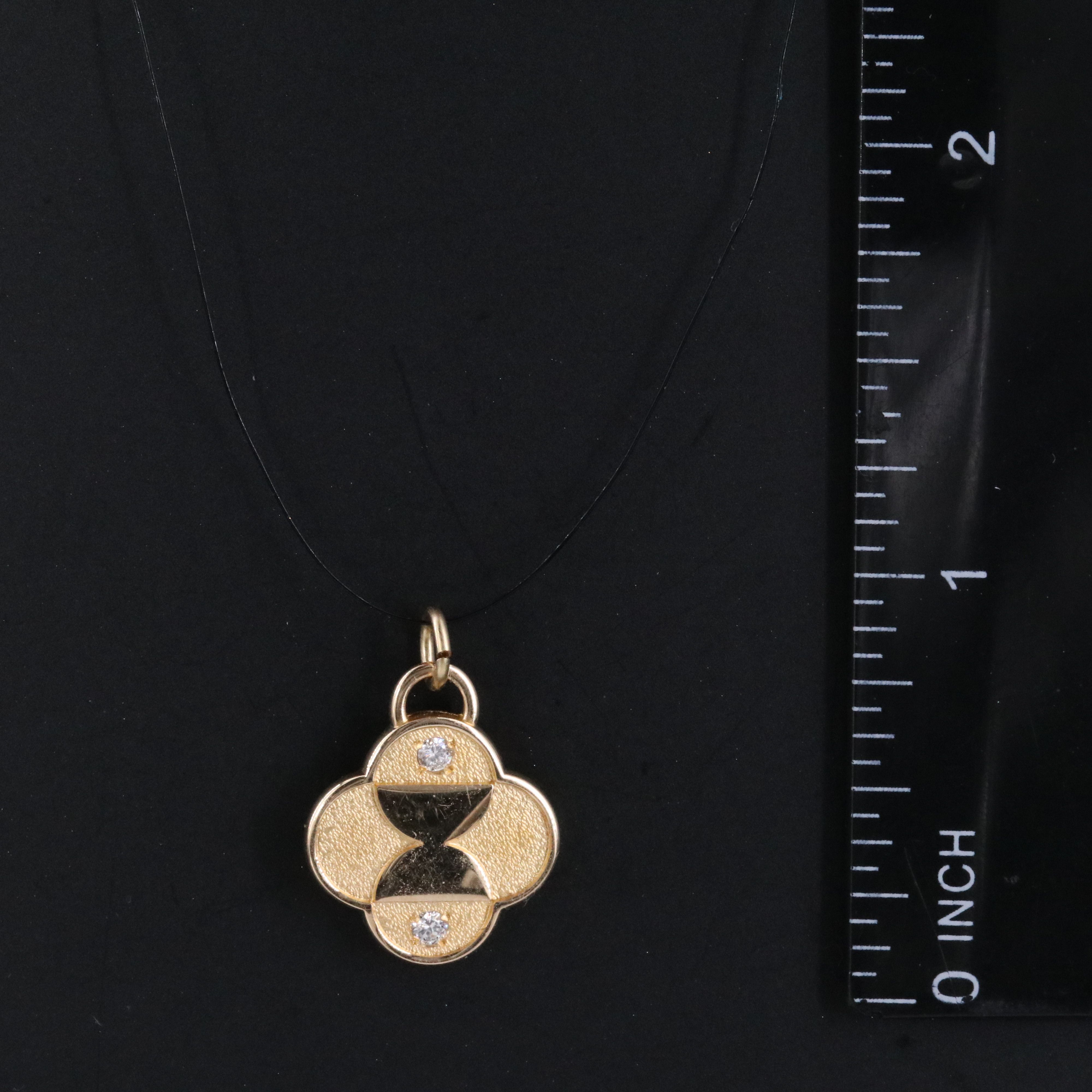 14K 0.06 CTW Diamond Pendant