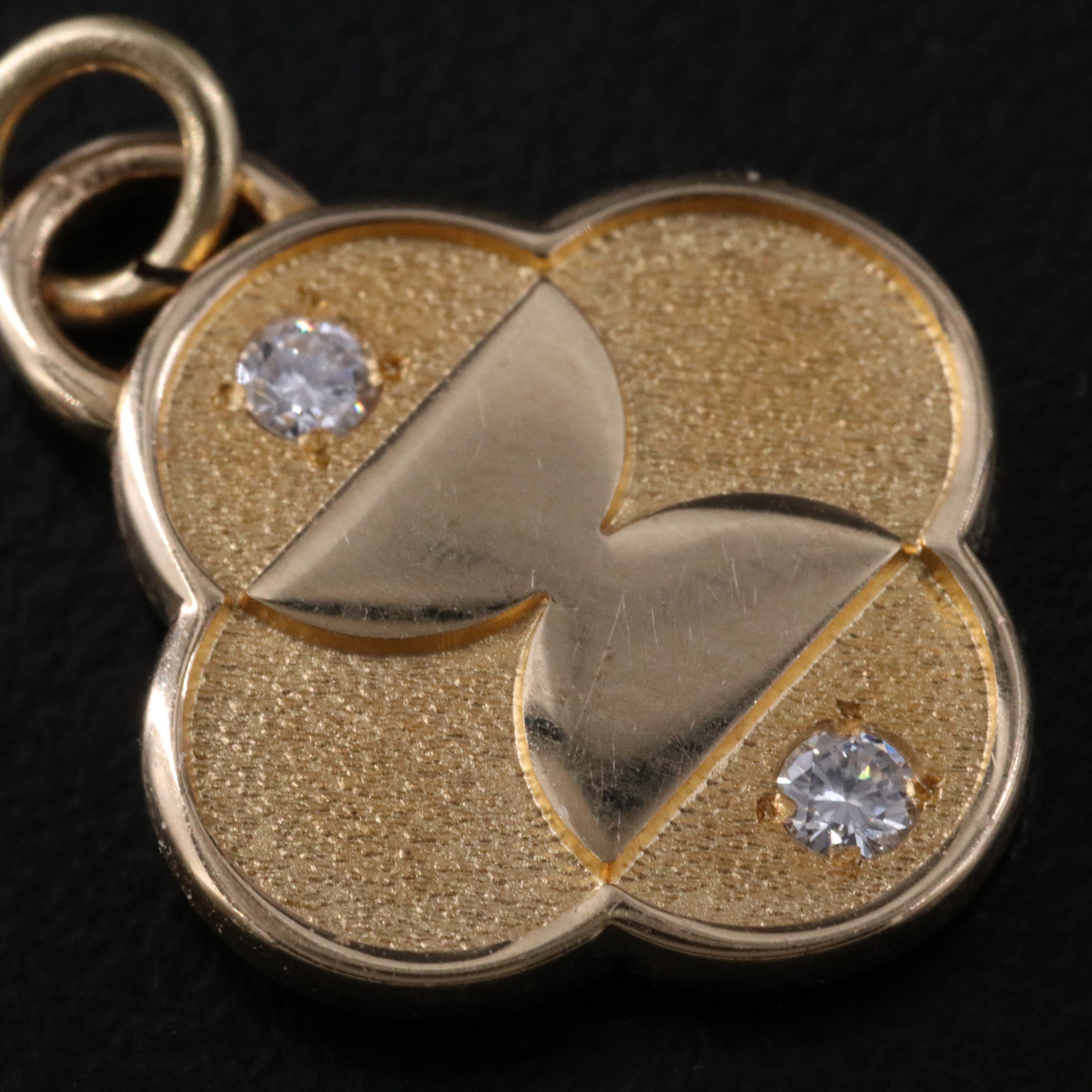 14K 0.06 CTW Diamond Pendant