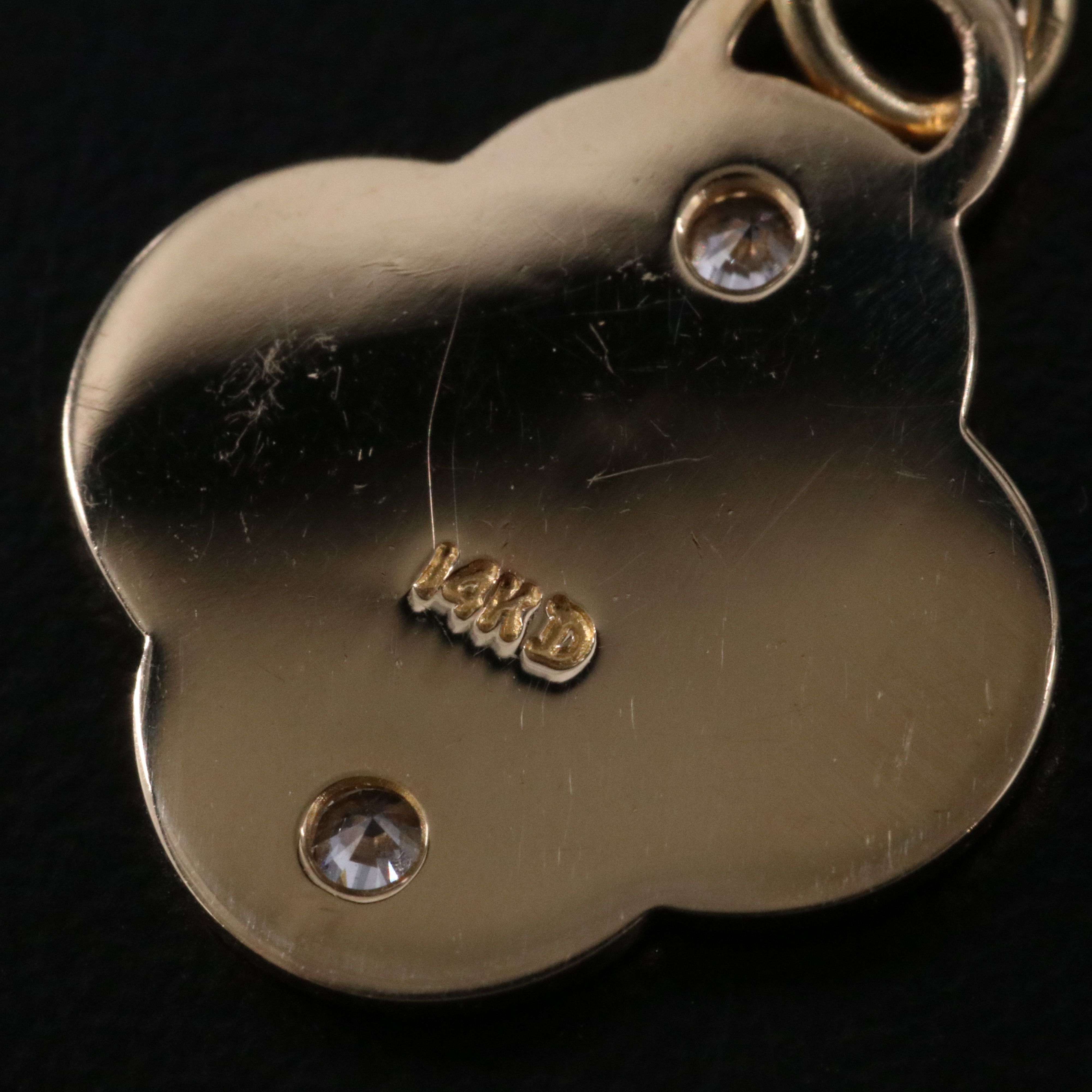 14K 0.06 CTW Diamond Pendant