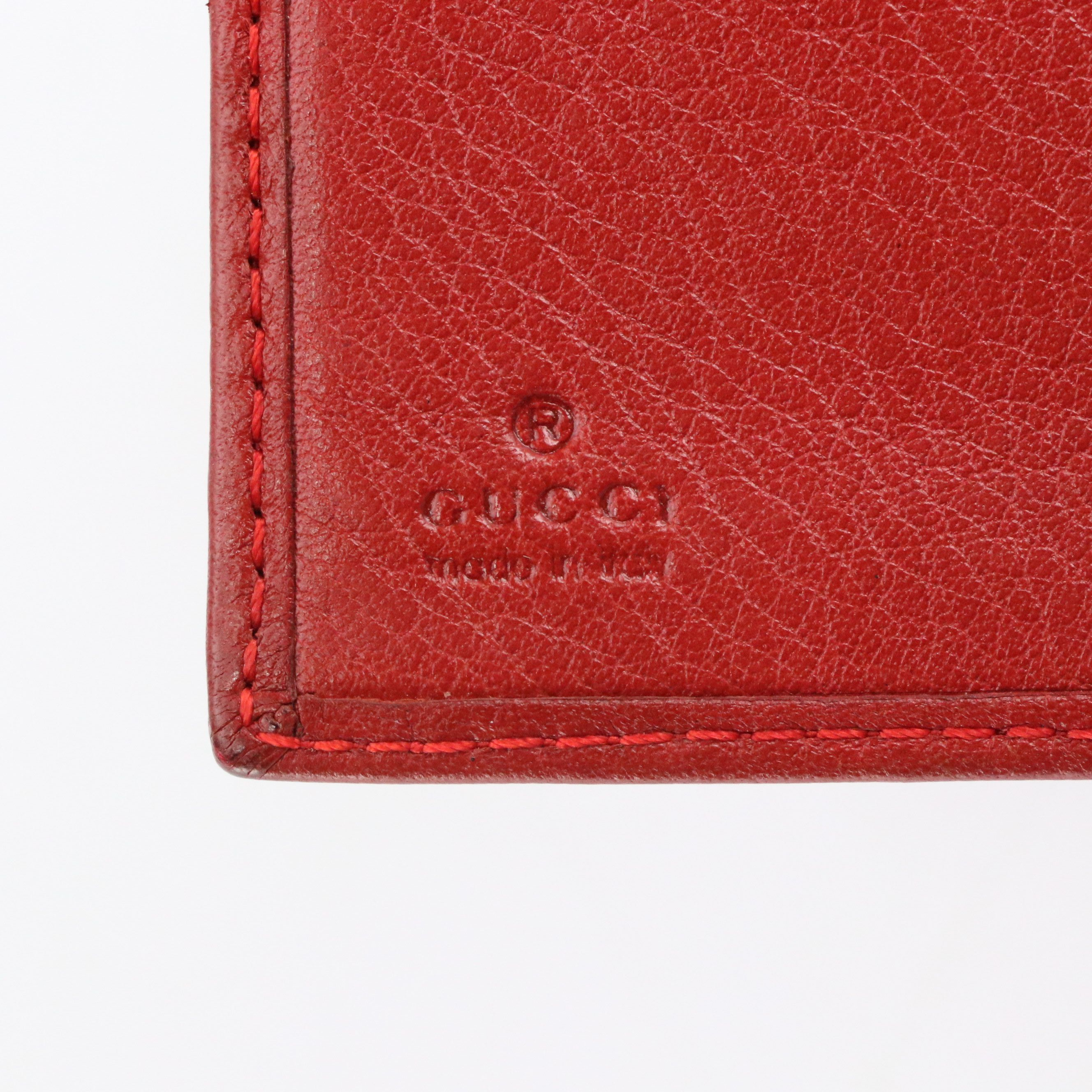 Gucci Compact Wallets in Red Guccissima Leather and GG Canvas