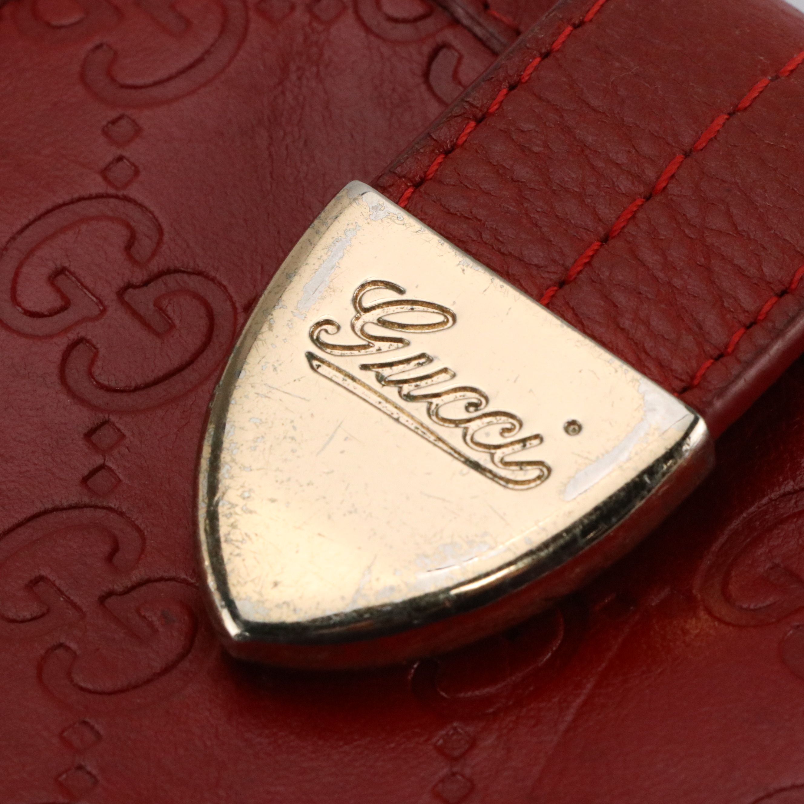 Gucci Compact Wallets in Red Guccissima Leather and GG Canvas