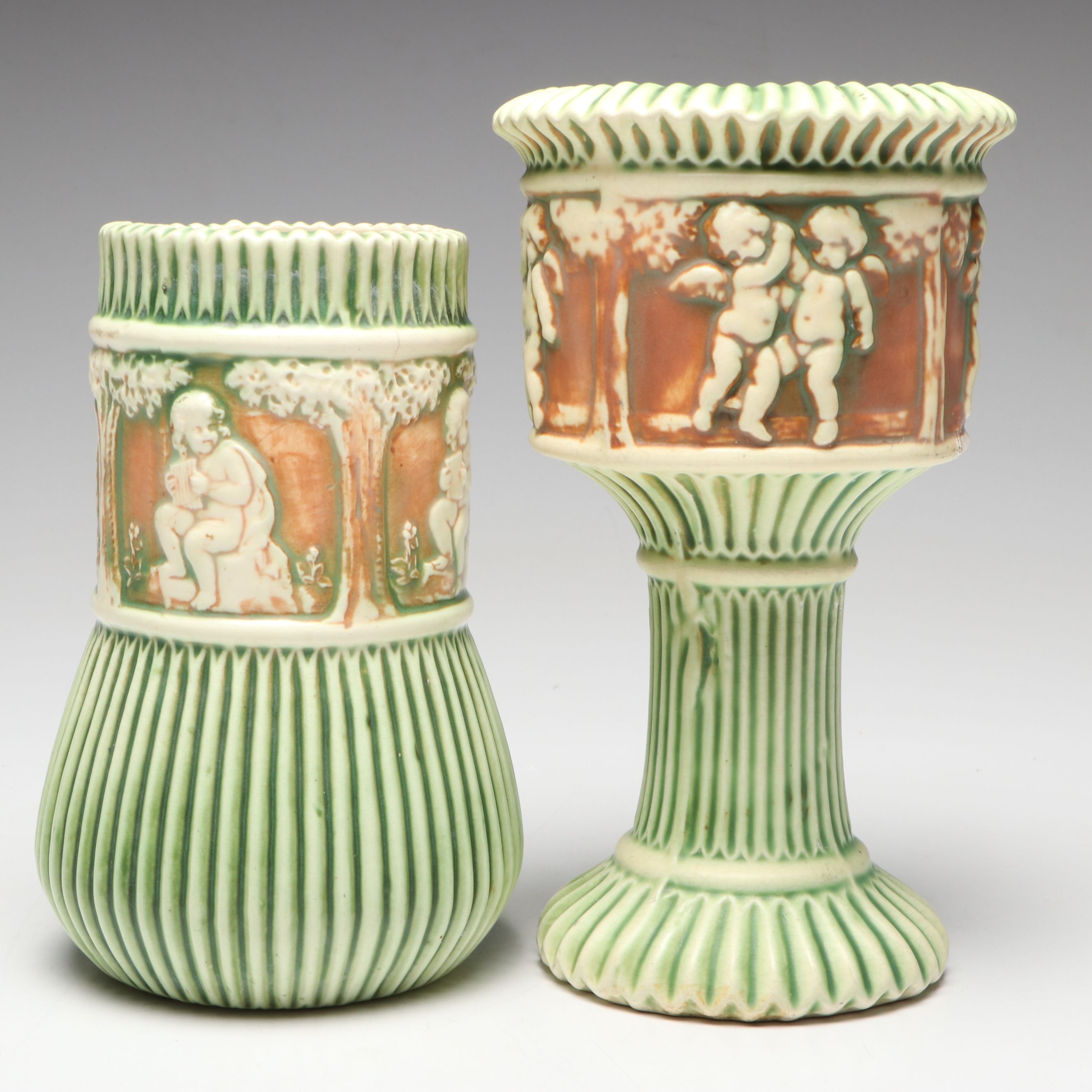 Roseville Pottery "Donatello" Ceramic Cherub Vases and Bowls, Early 20th Century