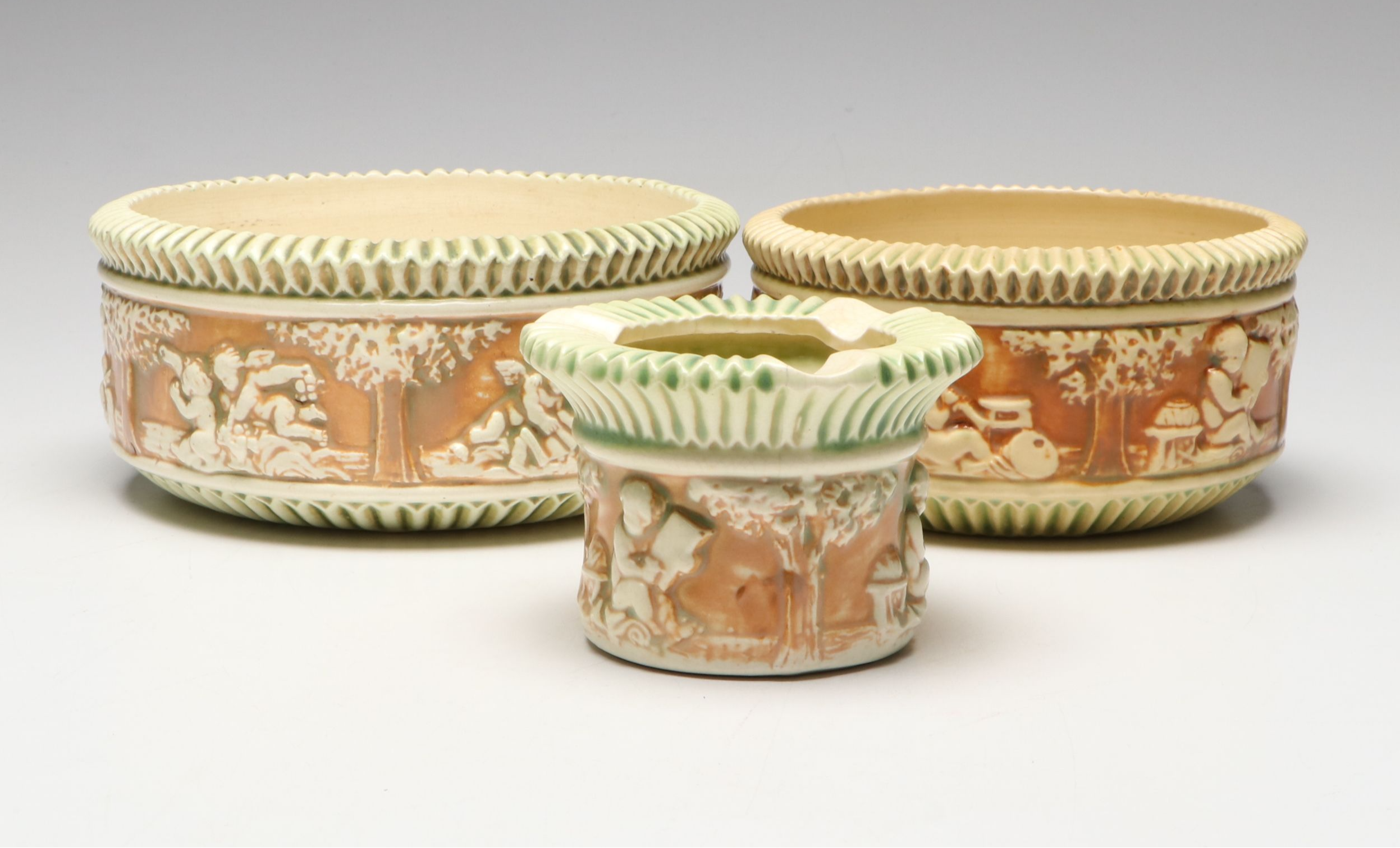 Roseville Pottery "Donatello" Ceramic Cherub Vases and Bowls, Early 20th Century