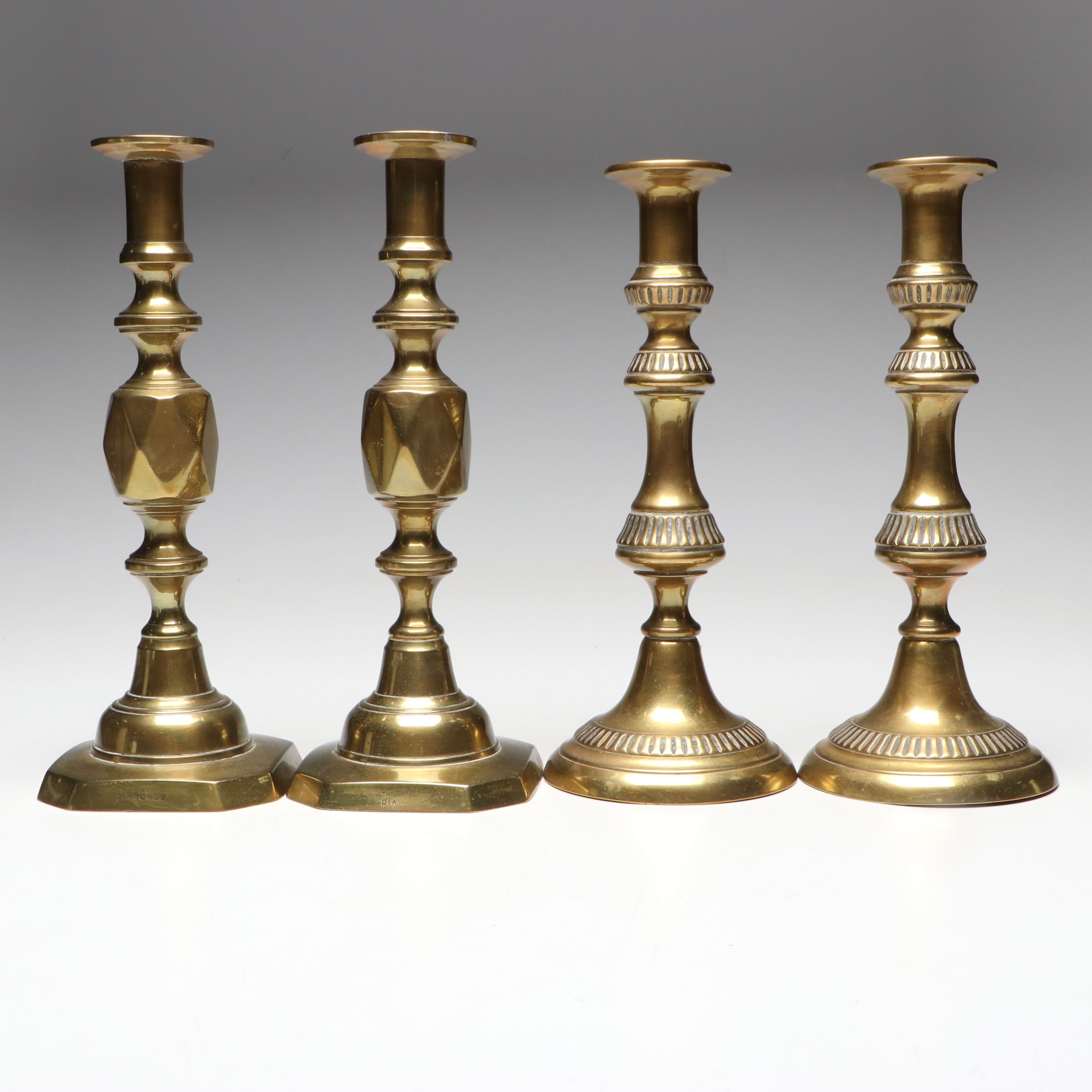 English Style "The Queen of Diamonds" with Other Brass Candlesticks